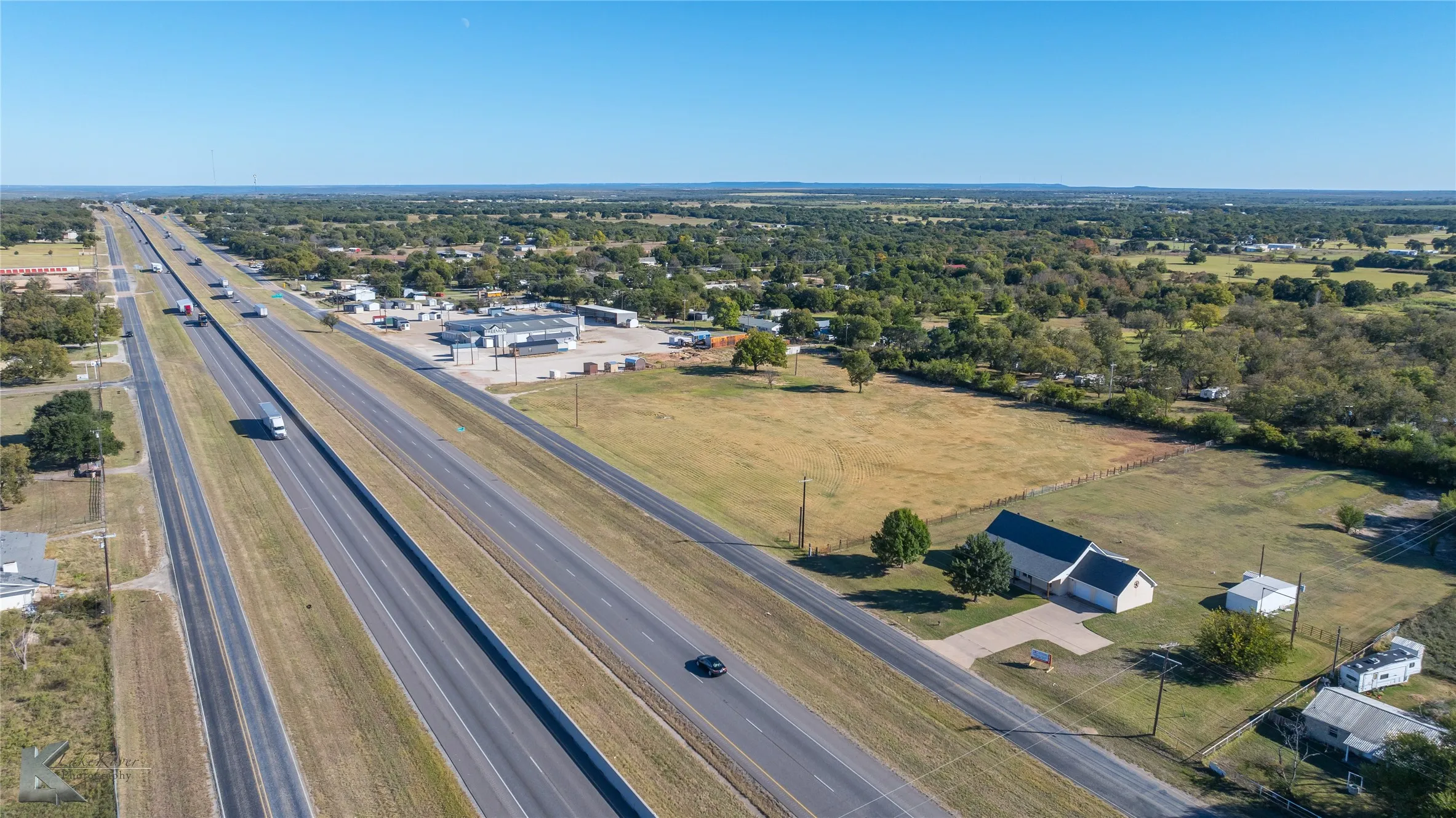 Drone / aerial view of a tree filled landscape