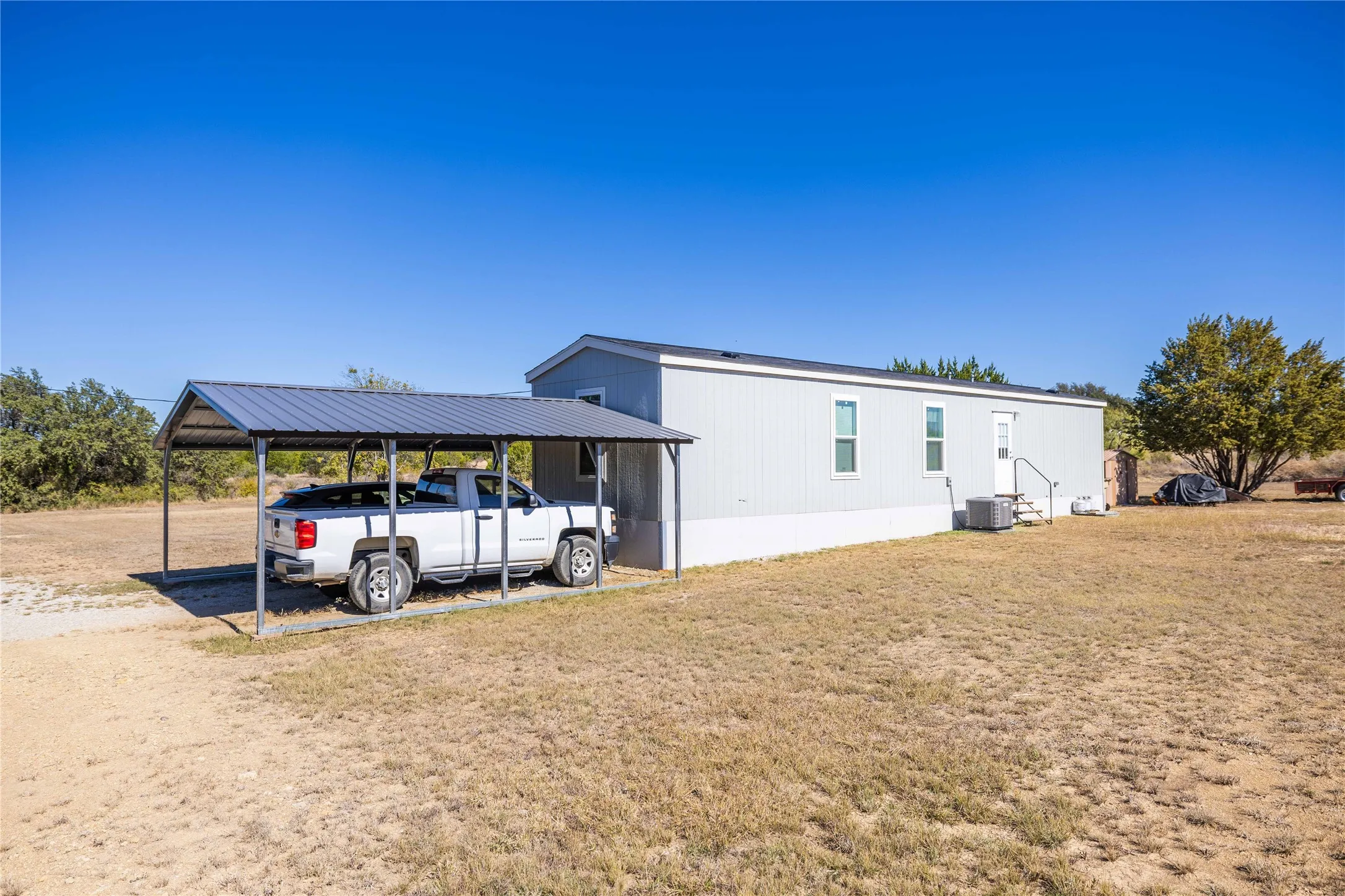 Manufactured Home For Sale in Brown County , 6935 County Road 467, Brownwood, Texas 76801, 2 Bedroom, 1 Bathroom, Garage spaces, 784 Sqft, built in 2024, Preowned, mls#21103441, Real Estate Agent in Brownwood, Homes For Sale in Brown county, Homes For Sale in Brownwood, Realtor in Brownwood Texas, Real Estate Brokerage Independent Realty Texas, Luminita Cordes Realtor