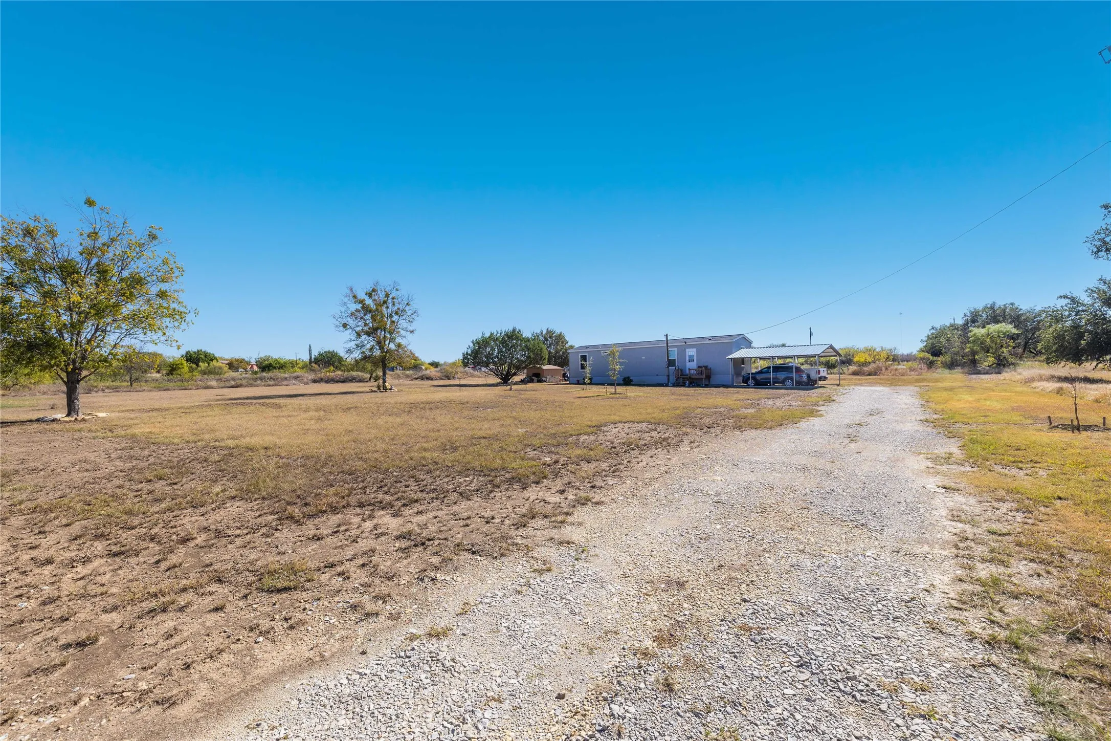 Manufactured Home For Sale in Brown County , 6935 County Road 467, Brownwood, Texas 76801, 2 Bedroom, 1 Bathroom, Garage spaces, 784 Sqft, built in 2024, Preowned, mls#21103441, Real Estate Agent in Brownwood, Homes For Sale in Brown county, Homes For Sale in Brownwood, Realtor in Brownwood Texas, Real Estate Brokerage Independent Realty Texas, Luminita Cordes Realtor