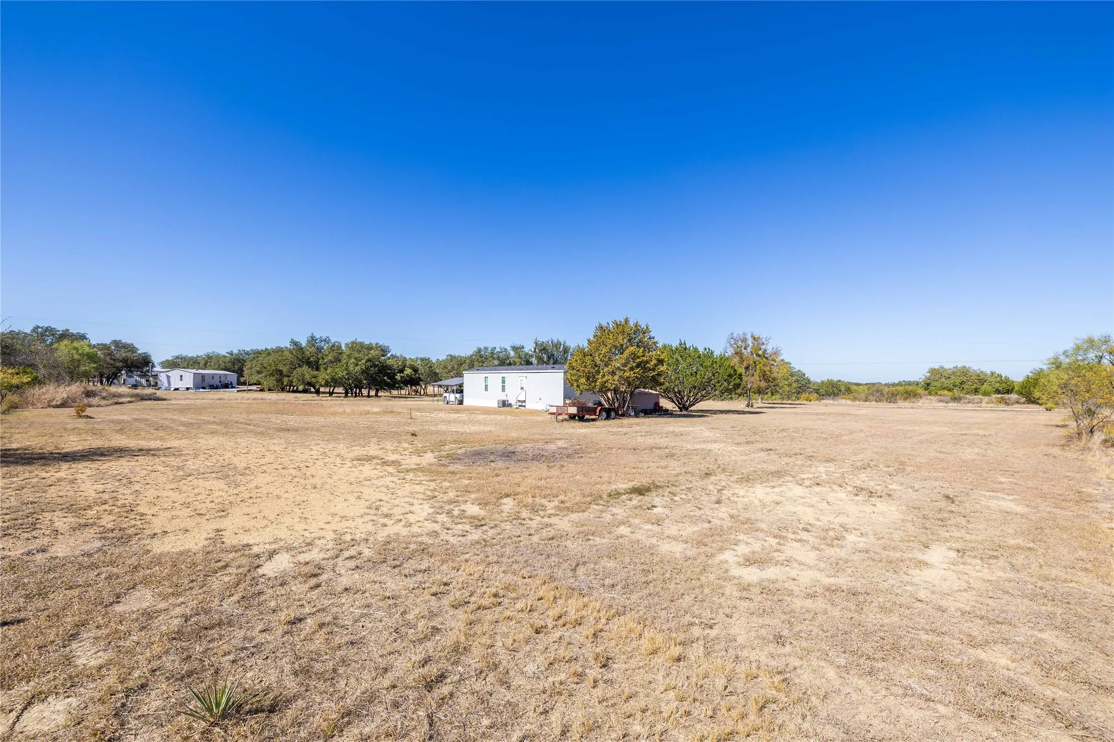 Manufactured Home For Sale in Brown County , 6935 County Road 467, Brownwood, Texas 76801, 2 Bedroom, 1 Bathroom, Garage spaces, 784 Sqft, built in 2024, Preowned, mls#21103441, Real Estate Agent in Brownwood, Homes For Sale in Brown county, Homes For Sale in Brownwood, Realtor in Brownwood Texas, Real Estate Brokerage Independent Realty Texas, Luminita Cordes Realtor