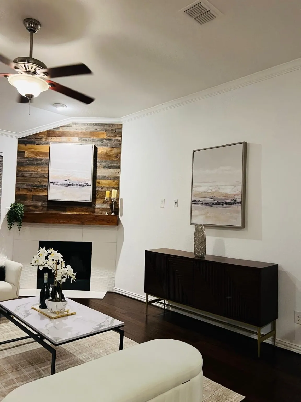 Fireplace and mantle and lots of light from windows