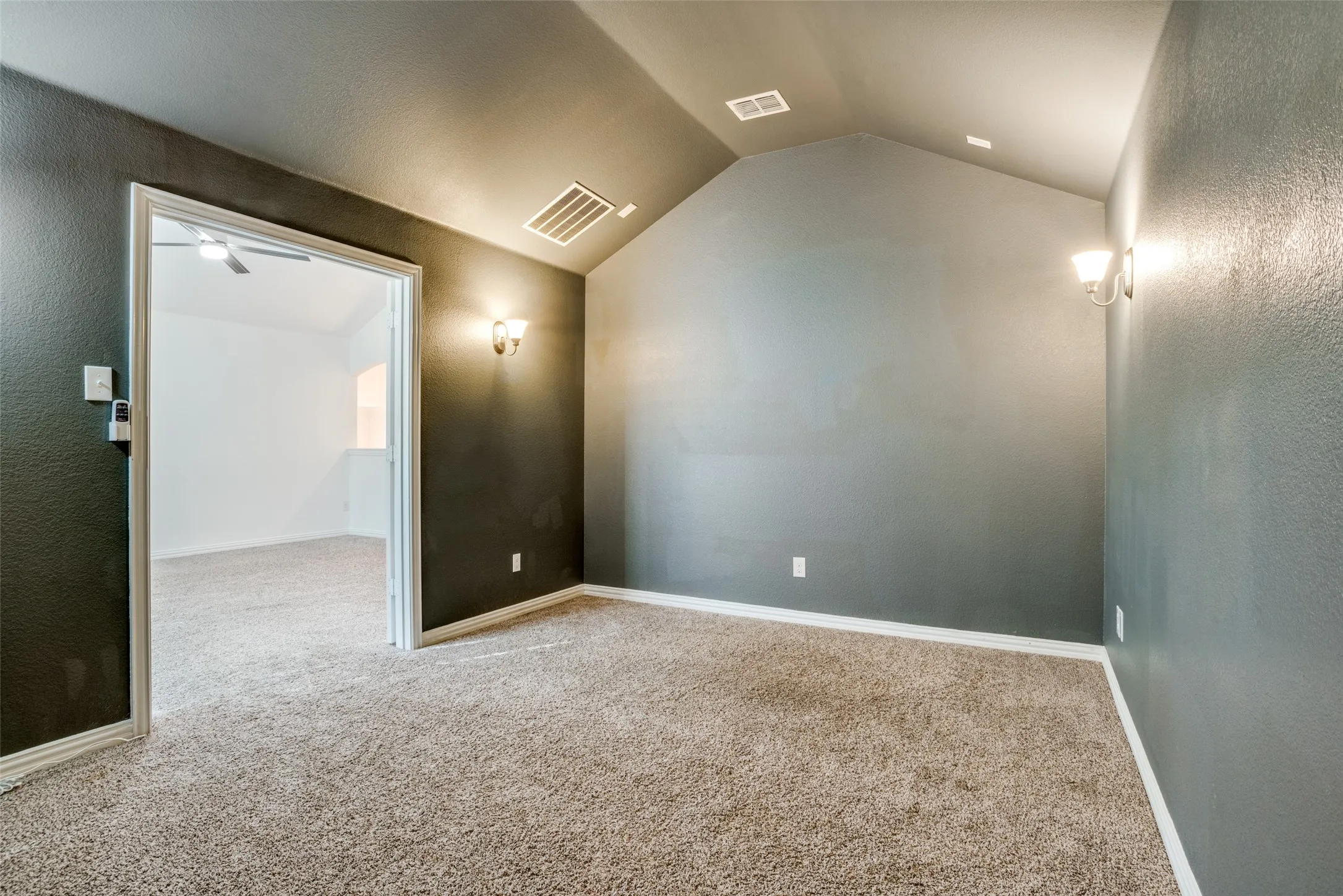 Oversized media room off the playroom upstairs