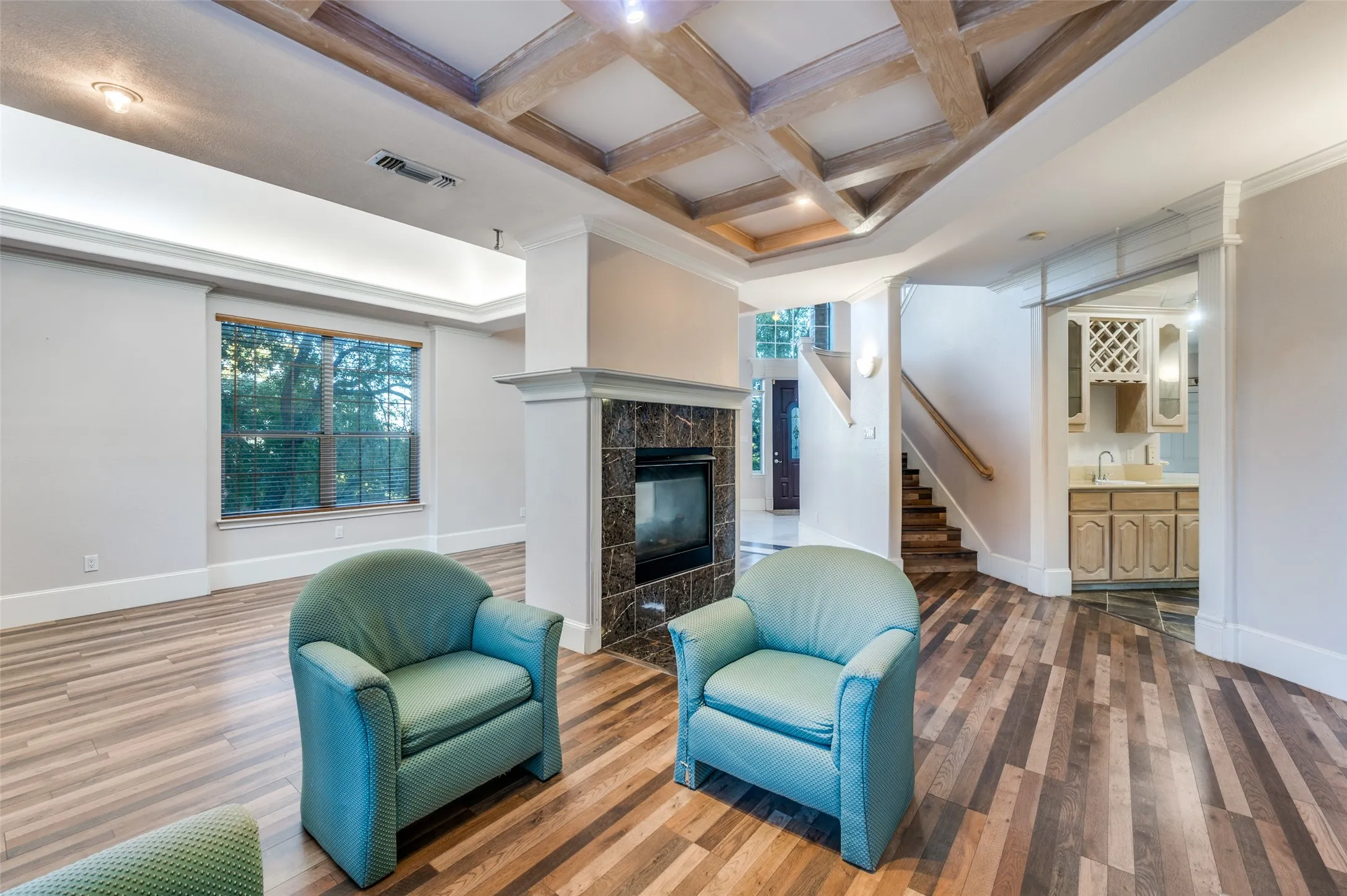 Easy access to the wet bar area AND the kitchen from this great space!