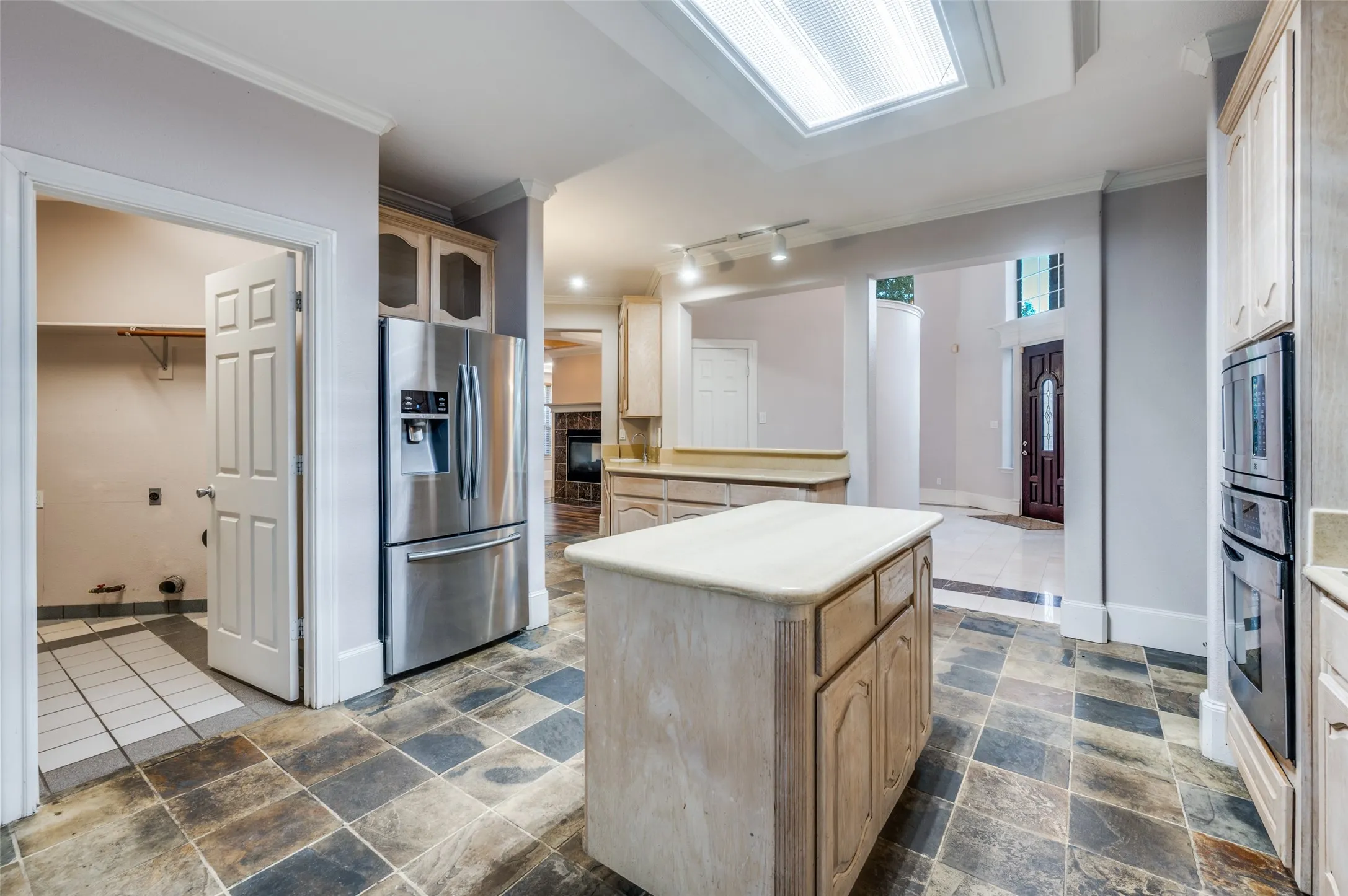 Island with GREAT storage, additional counter top area AND adjacent to the MINI kitchen AND laundry!