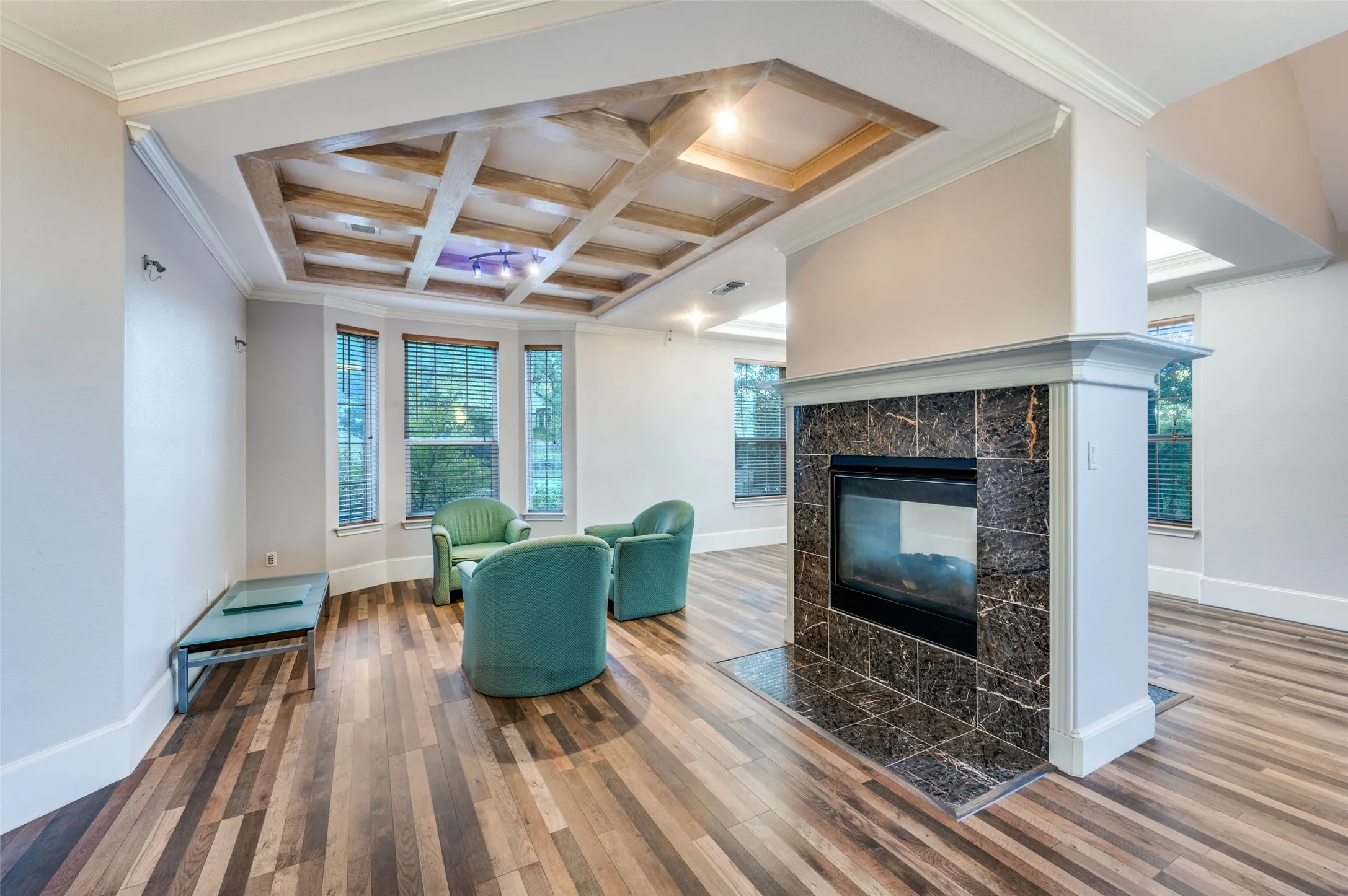 So many possibilities for this space.  Could be used as one BIG living OR dining on one side and living on the other side of this GREAT fireplace!