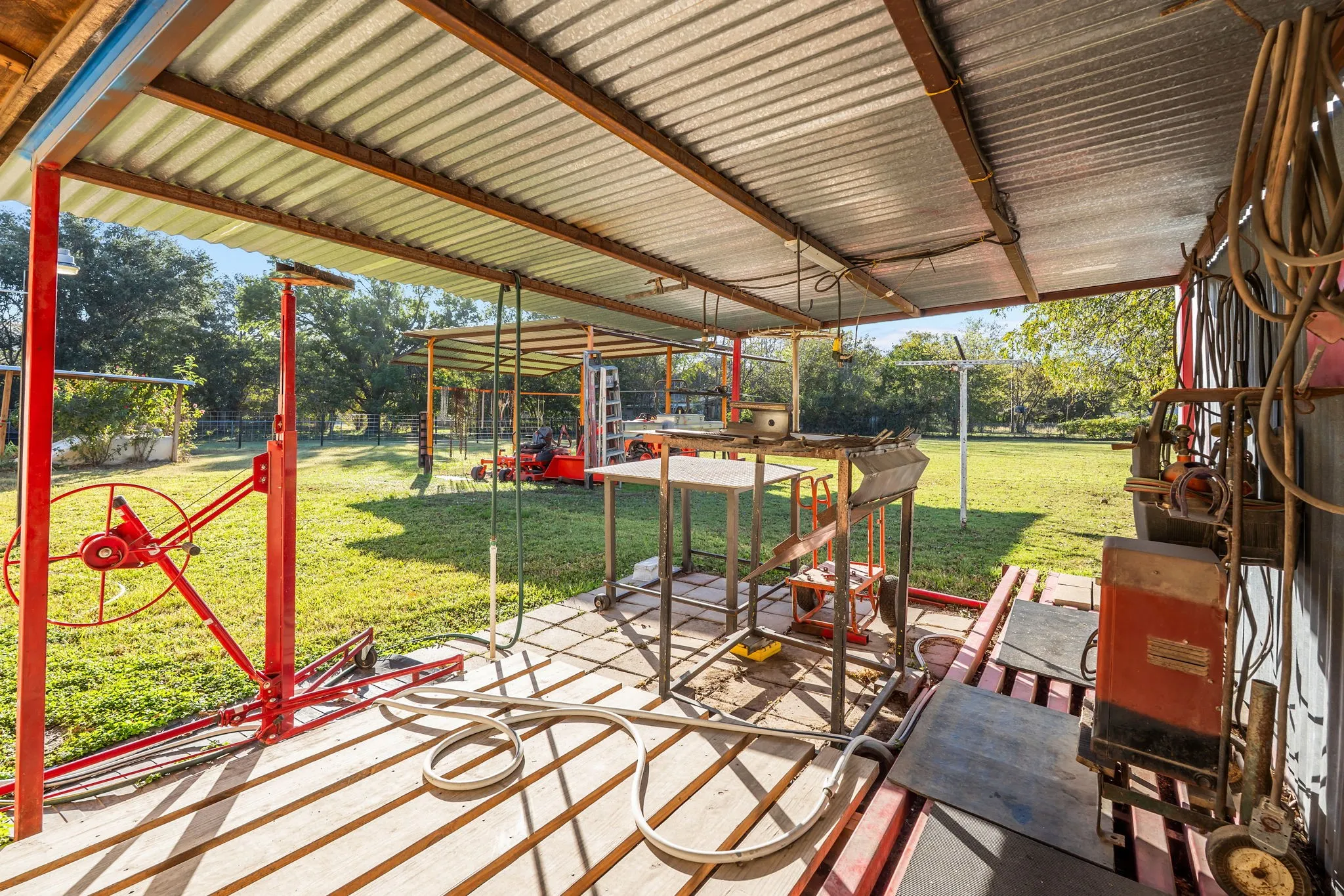 Fenced backyard with a patio