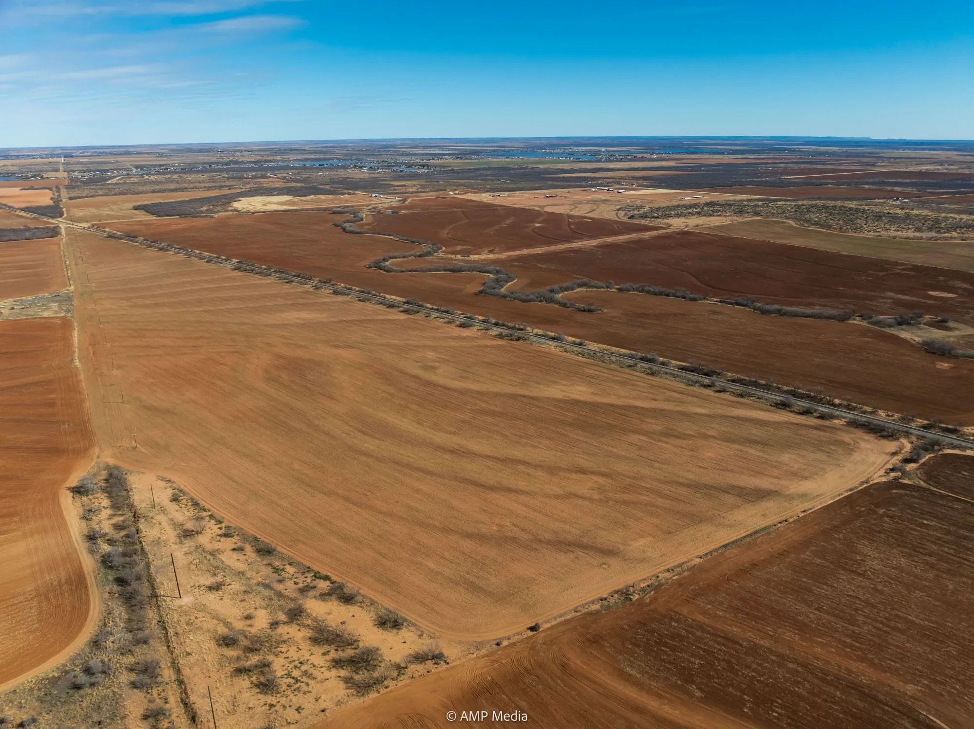 Aerial view of property and surrounding area featuring rural landscape
