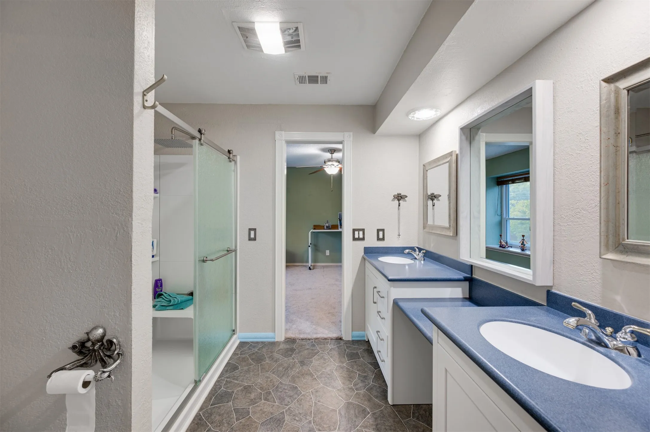 Jack and Jill bath with shower and separate sinks