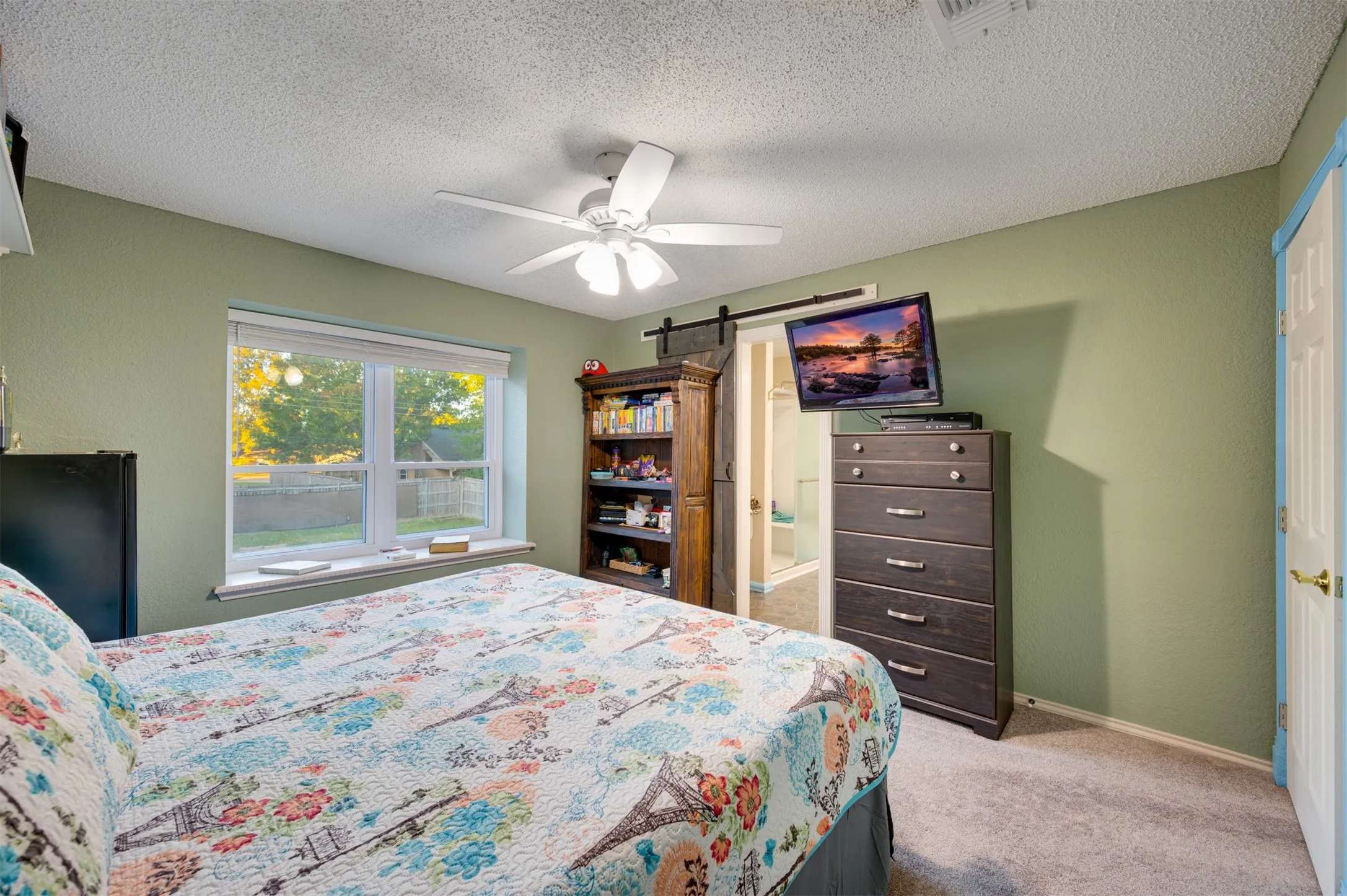 Upstairs bedroom with walk in closet that shares jack and jill bath