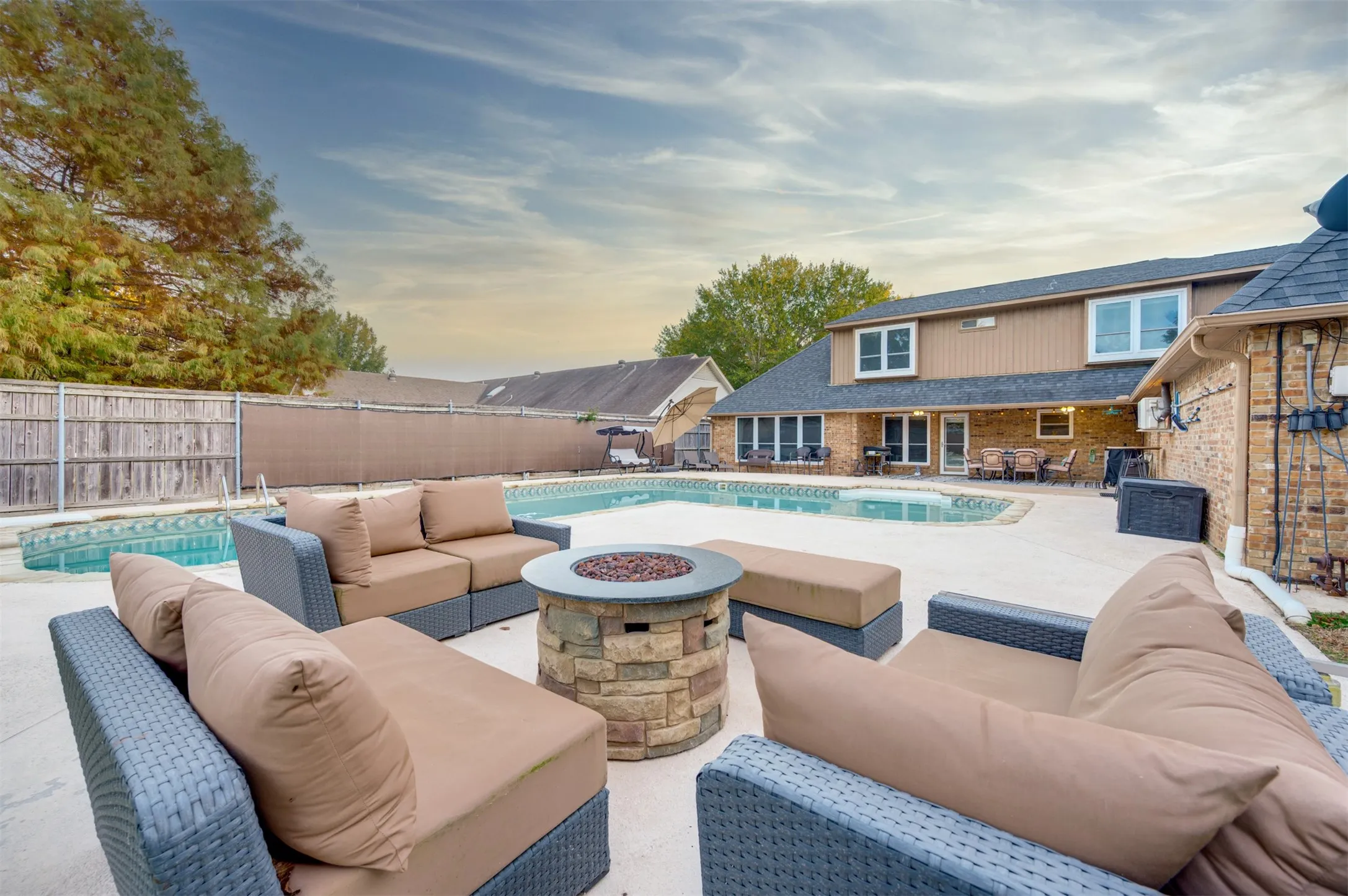 Plenty of room on pool decking for seating areas and fire pit