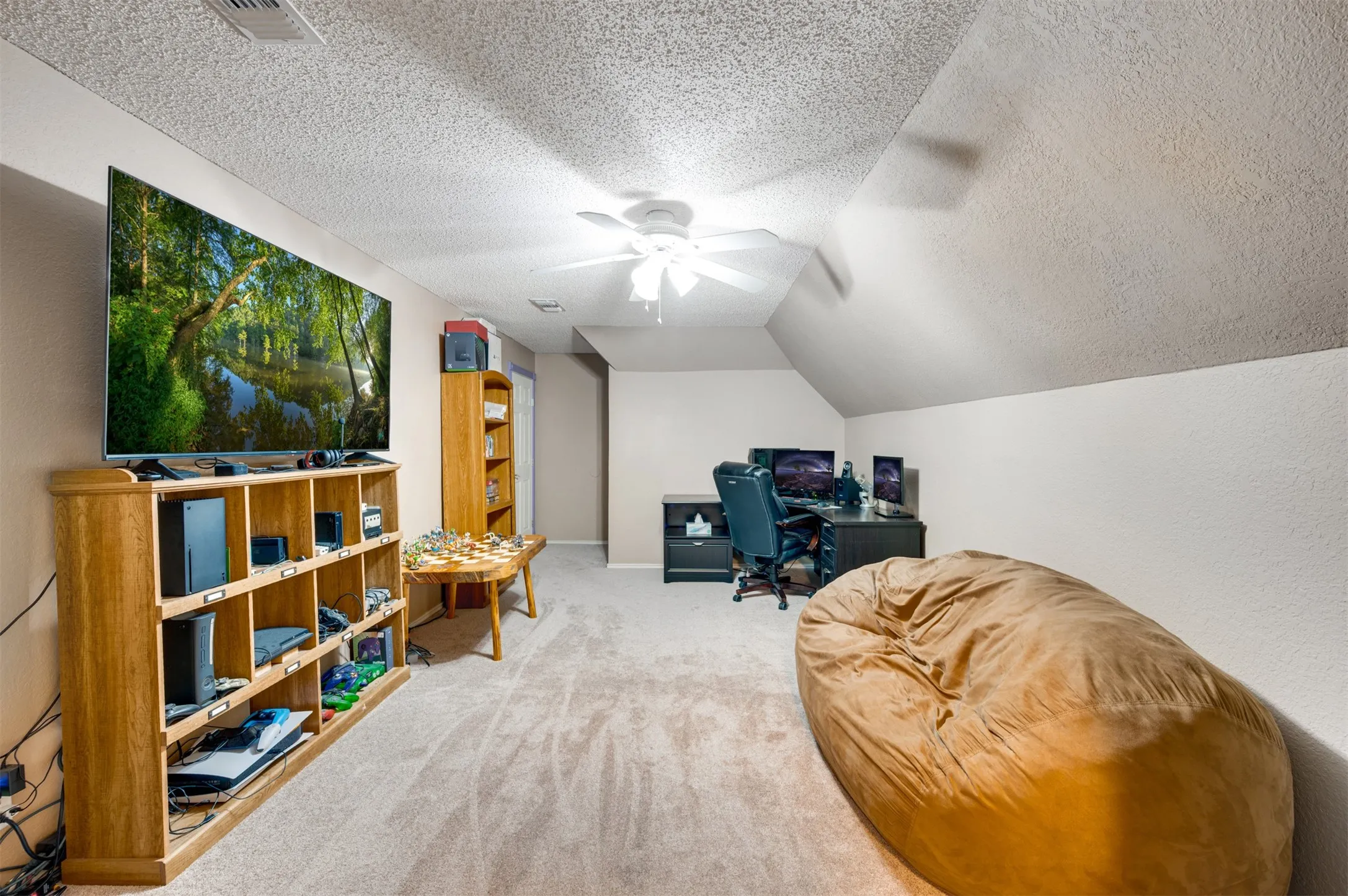 Game room/bonus room next door to upstairs bedrooms