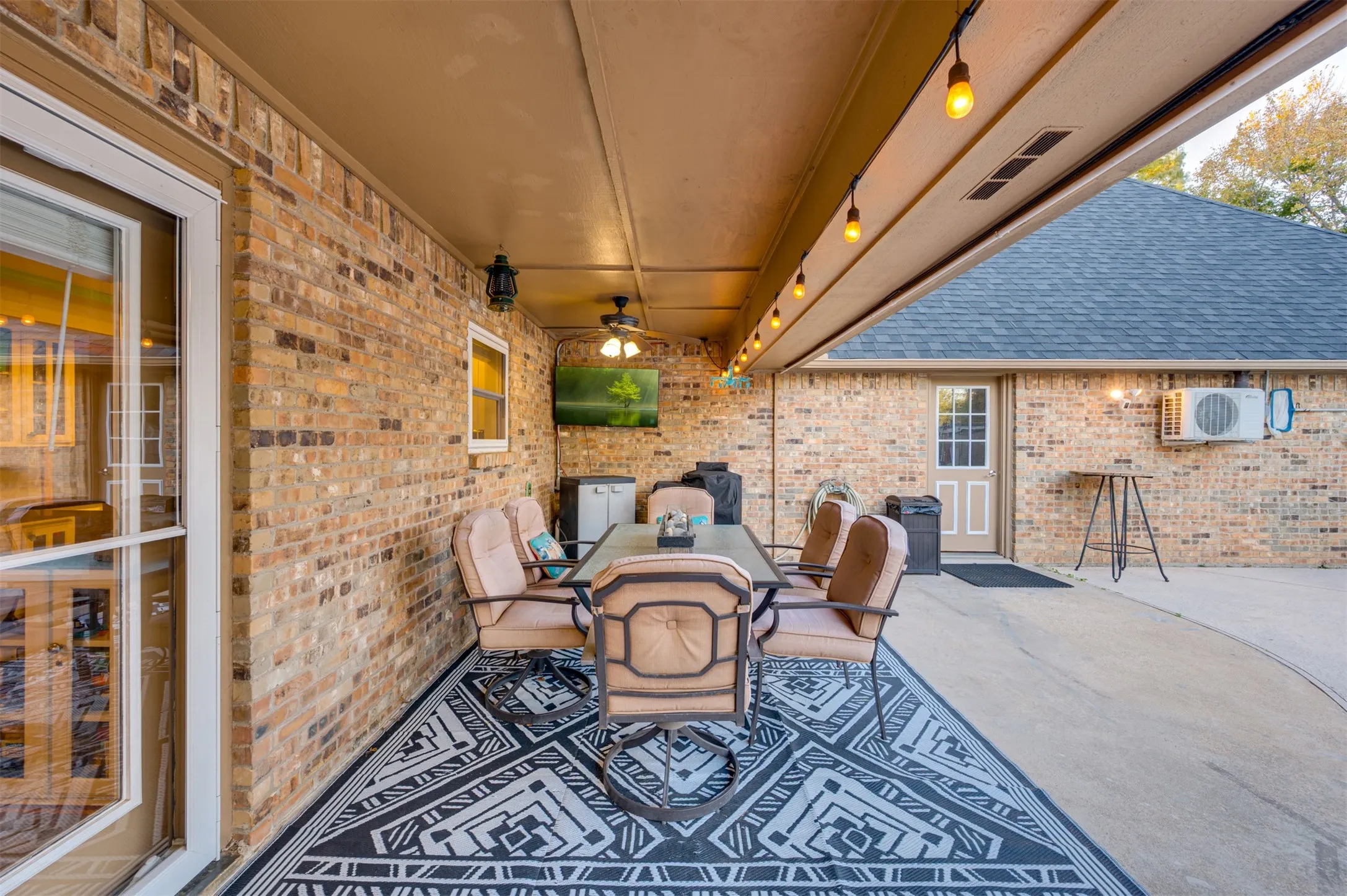 Covered patio overlooking pool