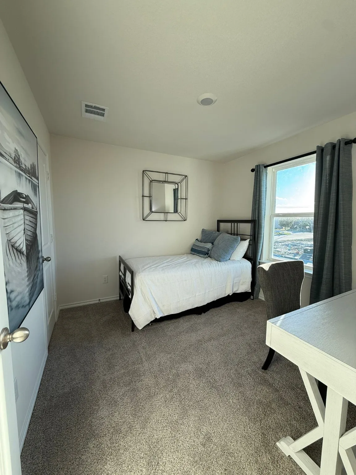 Bedroom with carpet and baseboards