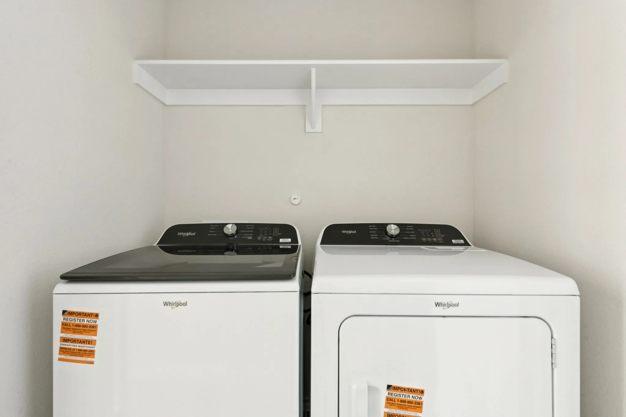 Laundry area with washer and clothes dryer