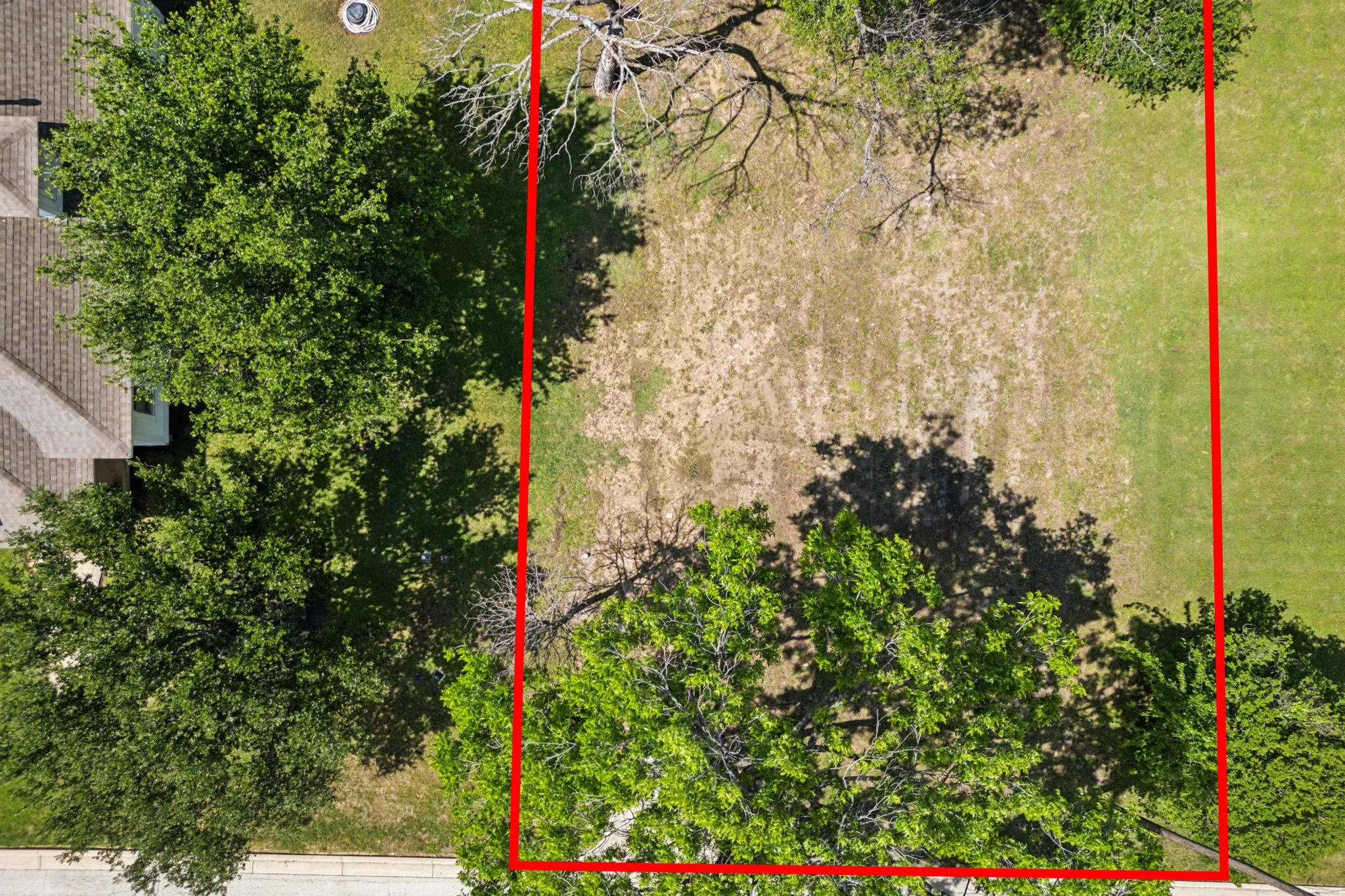 Aerial view of property's location featuring property parcel outlined