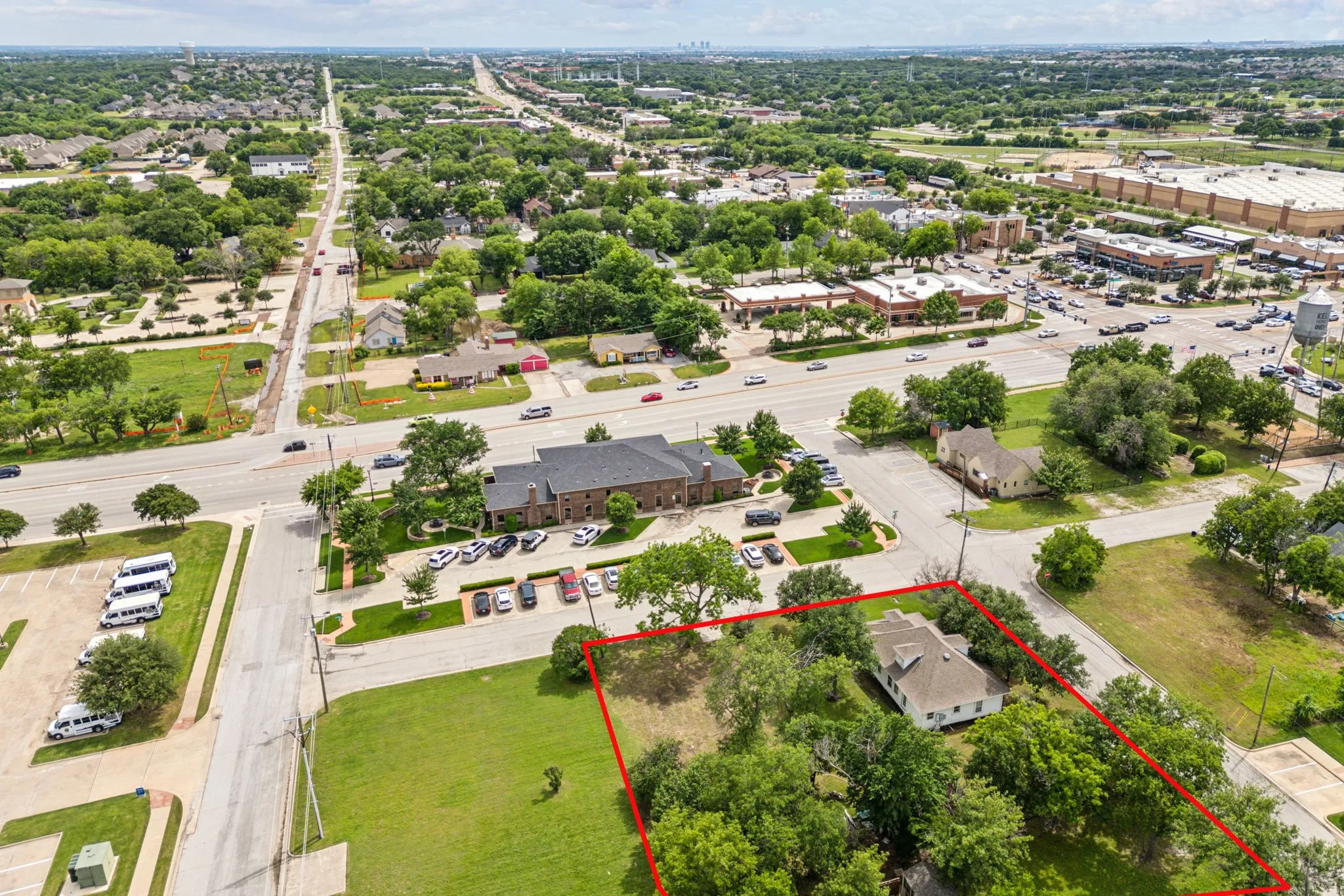 Aerial overview of property's location featuring property parcel outlined