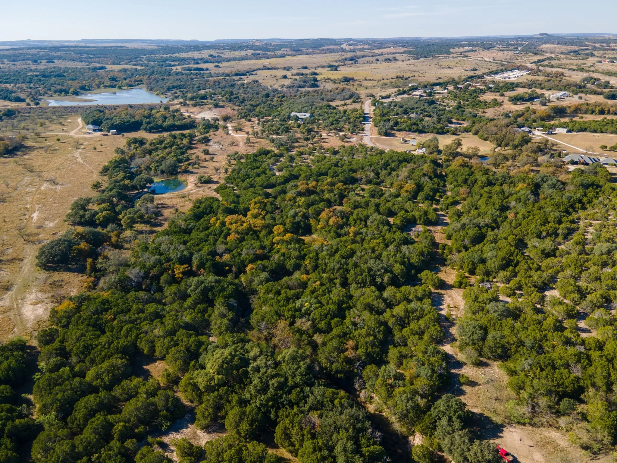 Aerial overview of property's location featuring a nearby body of water