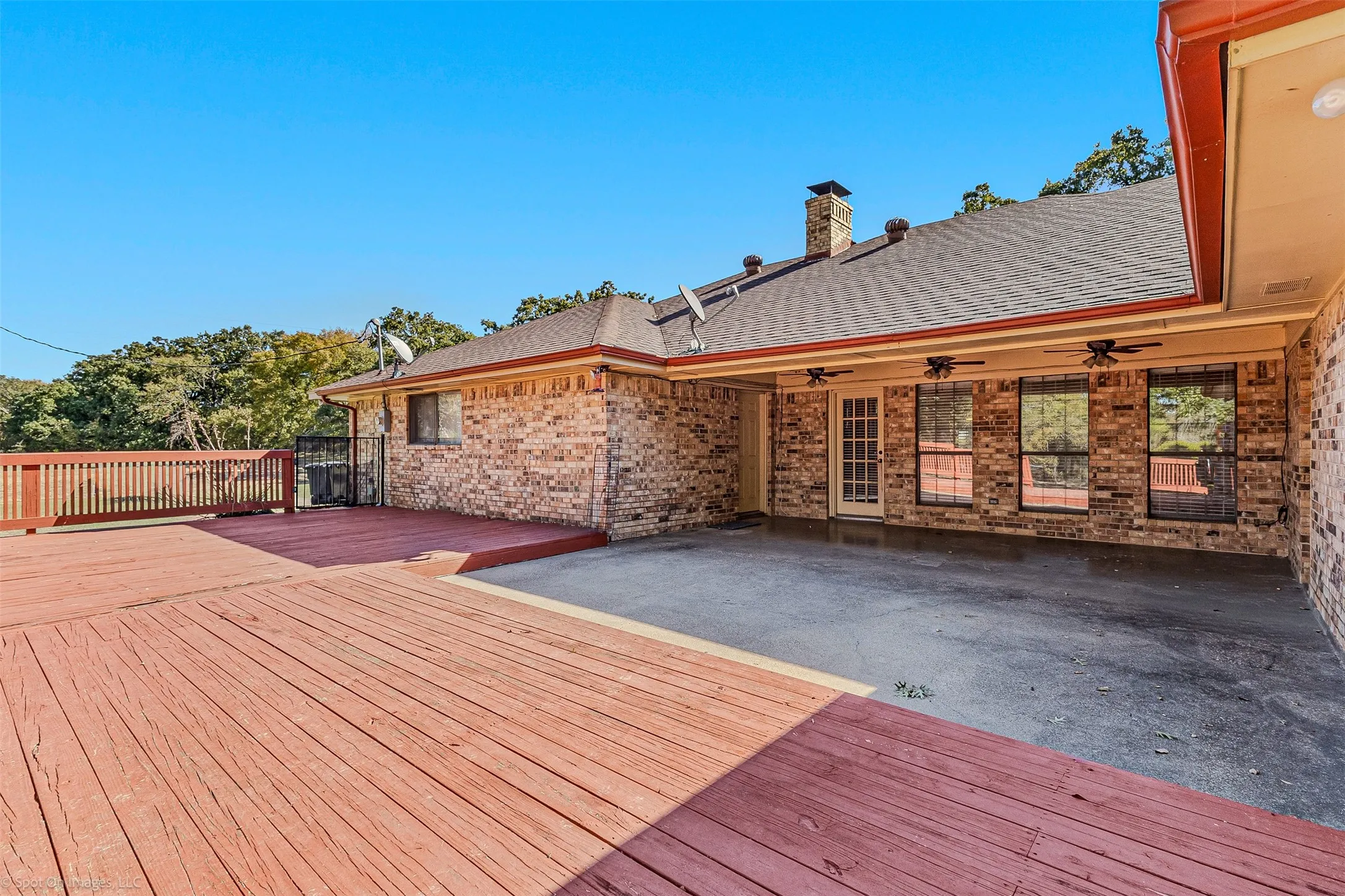 Deck featuring a ceiling fan and a patio area