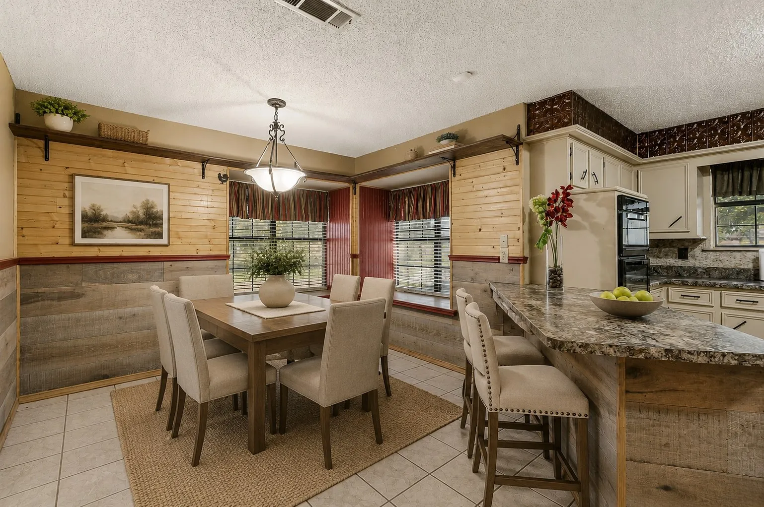 Virtually staged Dining Area with light tile patterned
