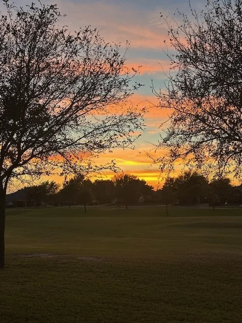Sunset over 14th Fairway from back patio.