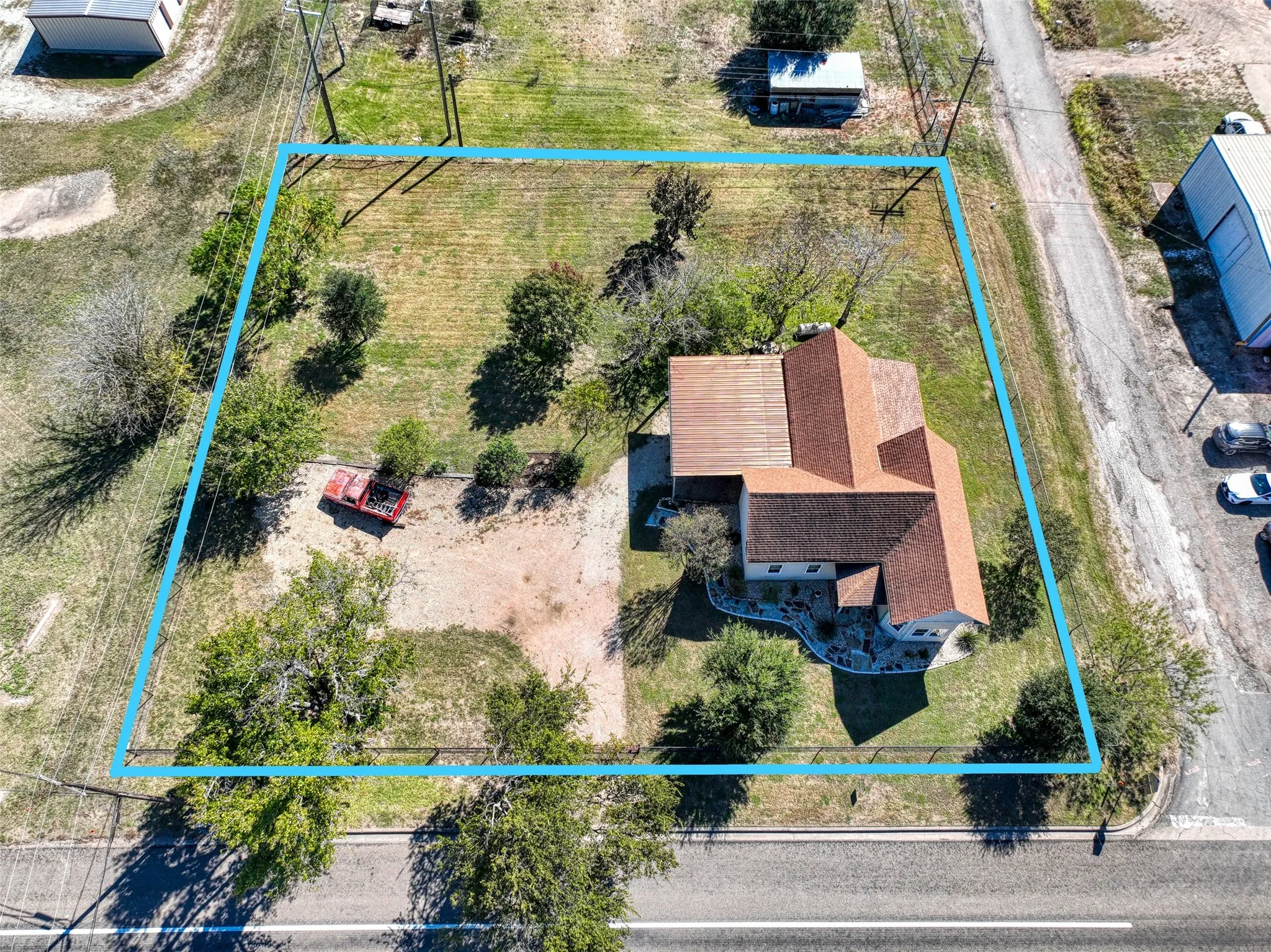 Aerial overview of property's location featuring property parcel outlined