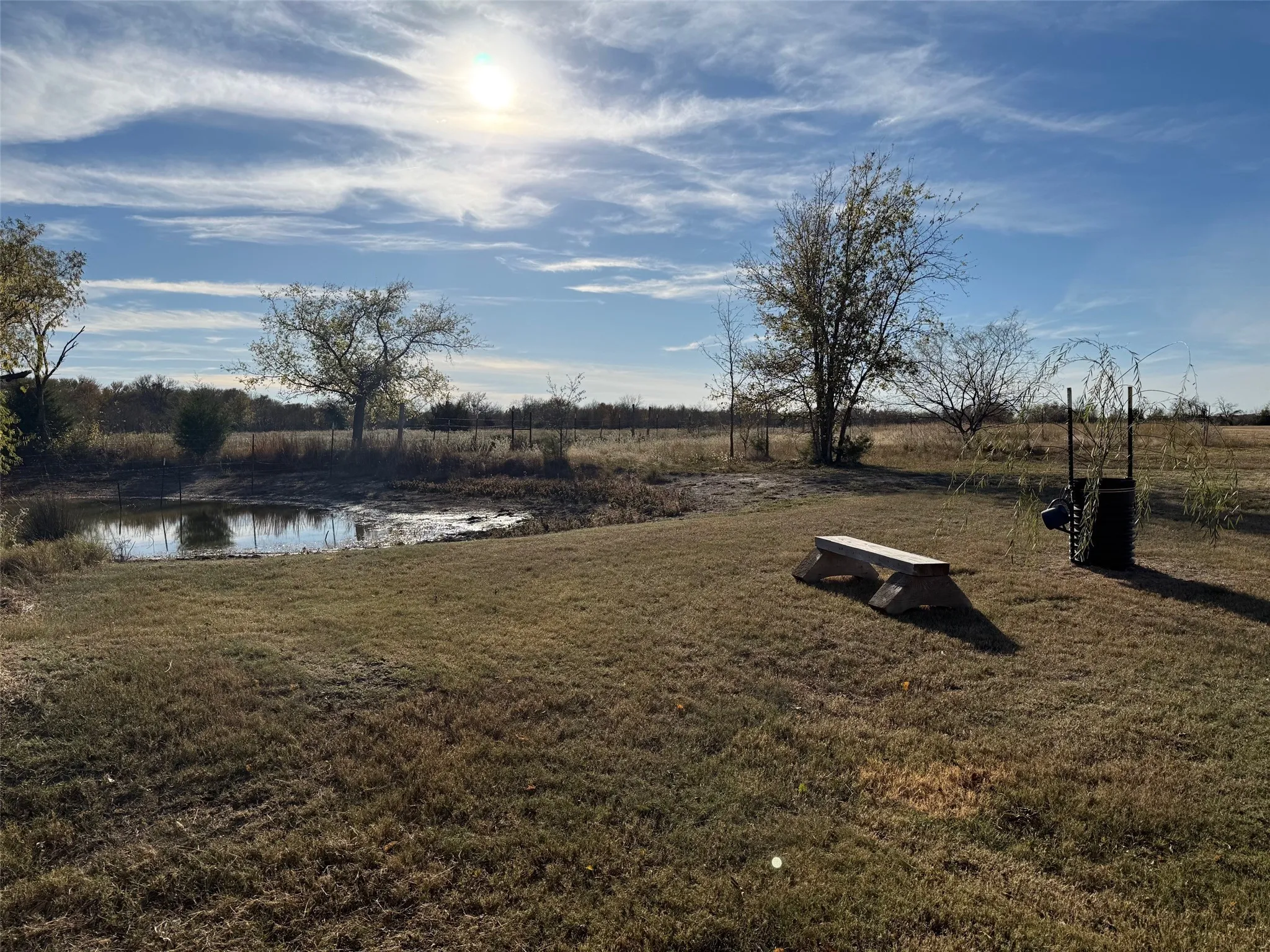 View of green lawn with a water view