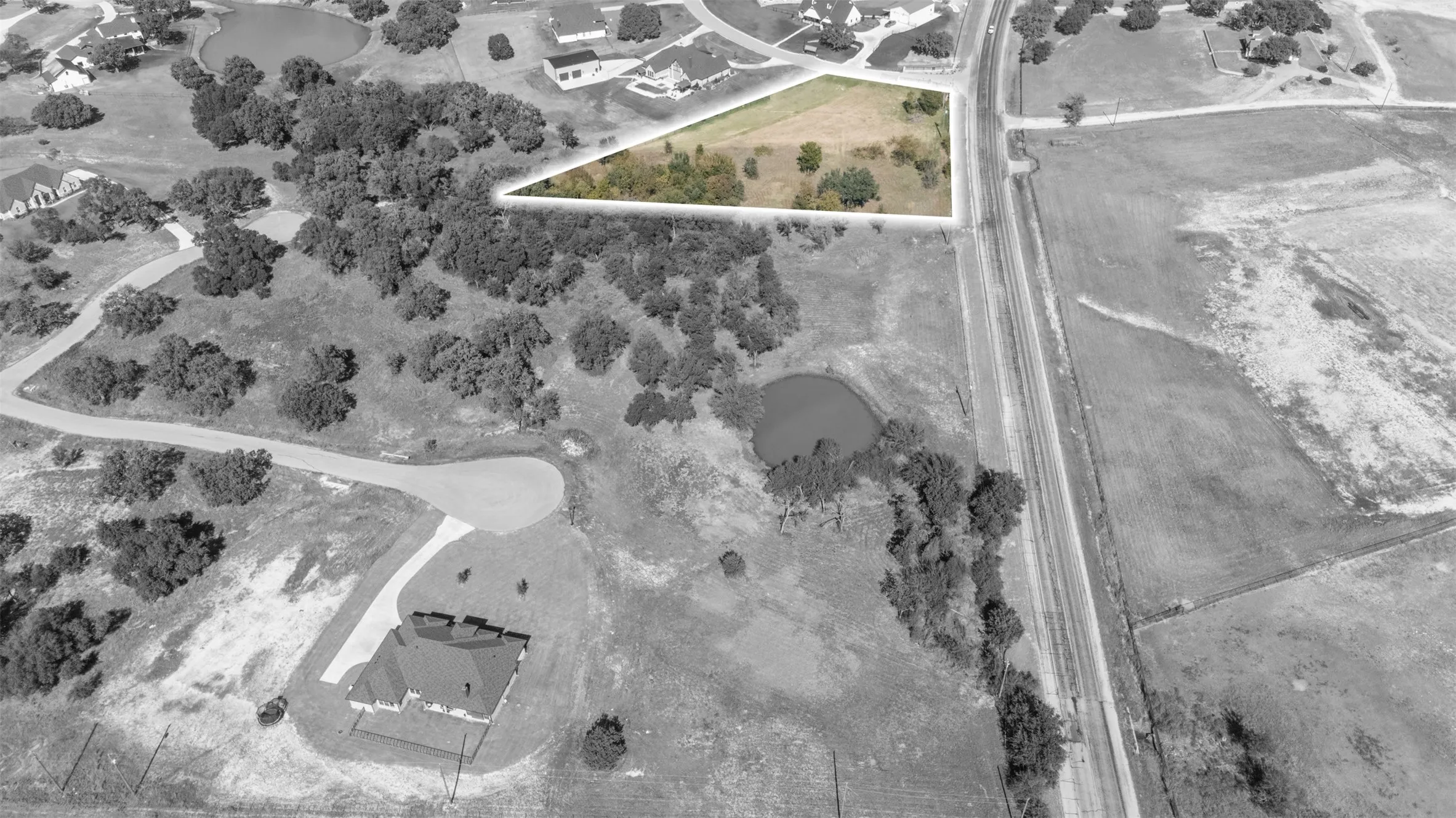 Aerial overview of property's location with property boundaries highlighted
