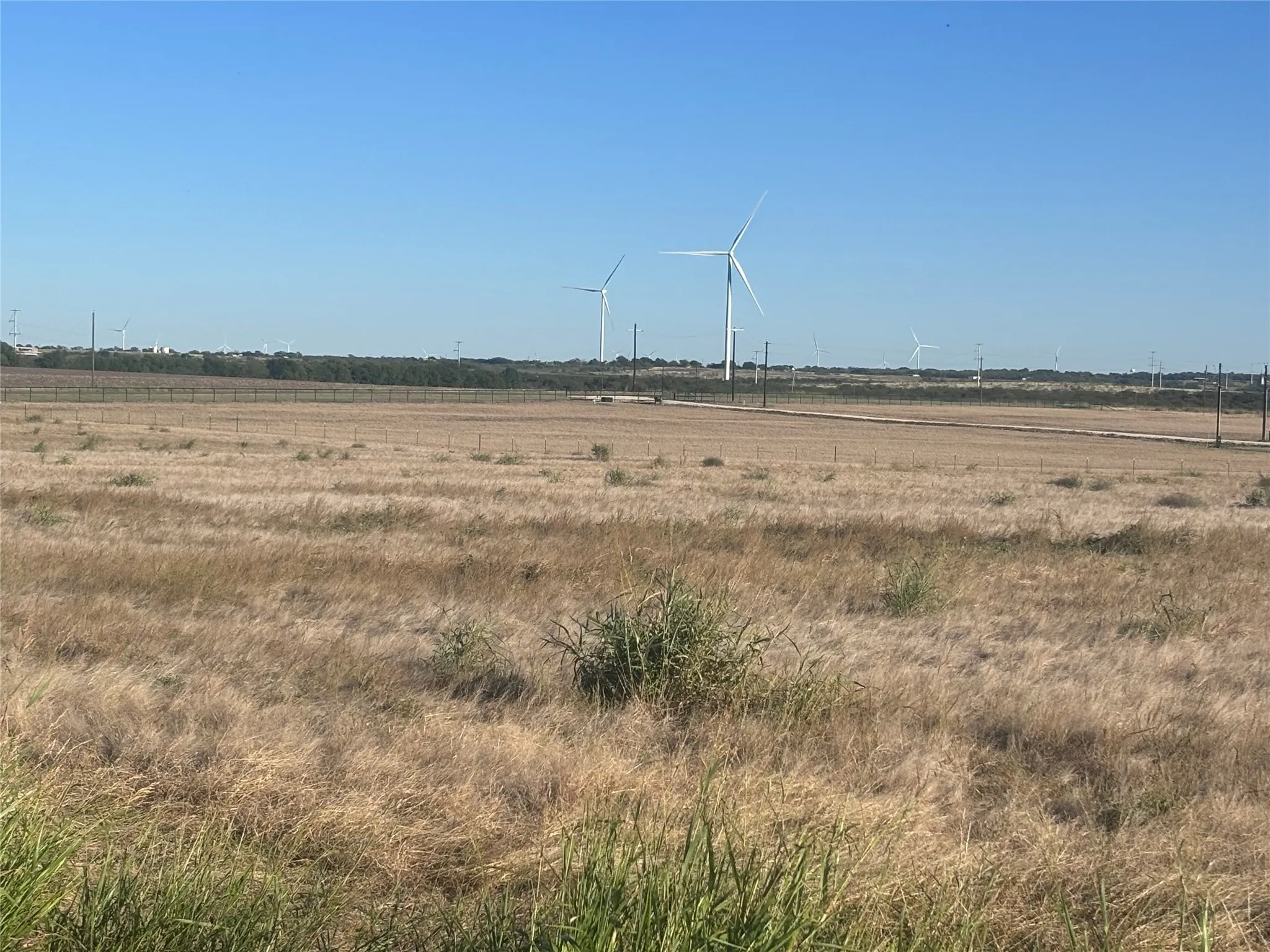 View of yard with a rural view