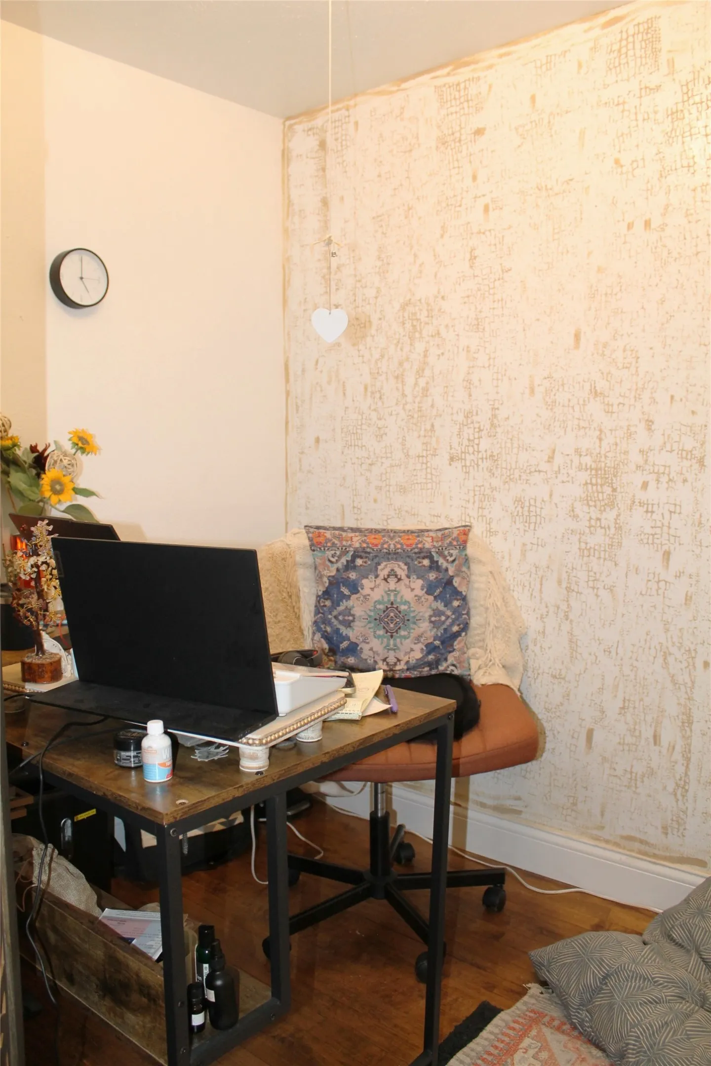 Office space with dark wood finished floors and baseboards