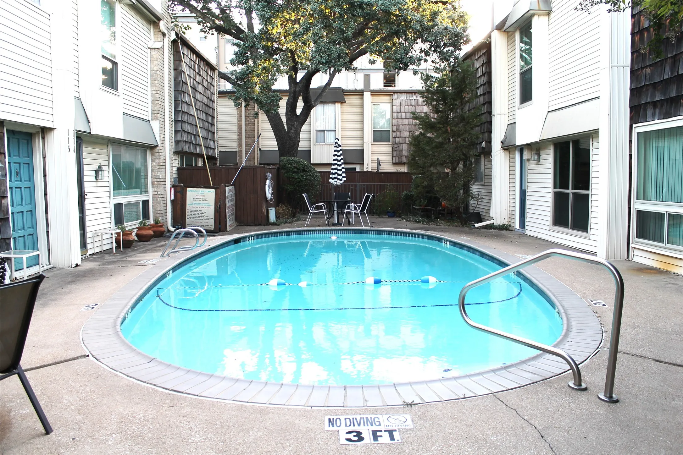 Community pool featuring a patio area