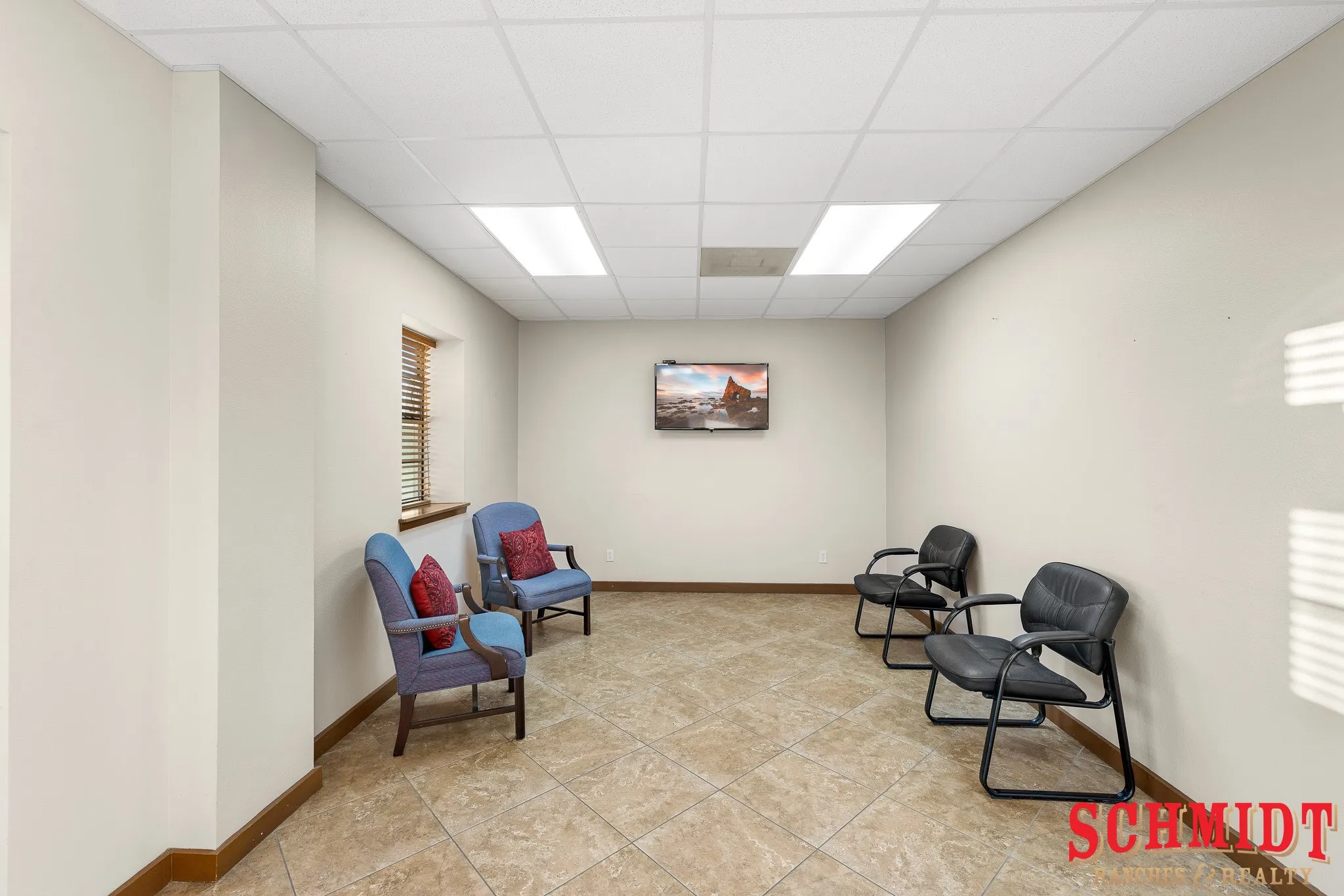 Drop ceiling with recessed lighting, neutral wall finishes, tiled flooring, and a window with wood blinds