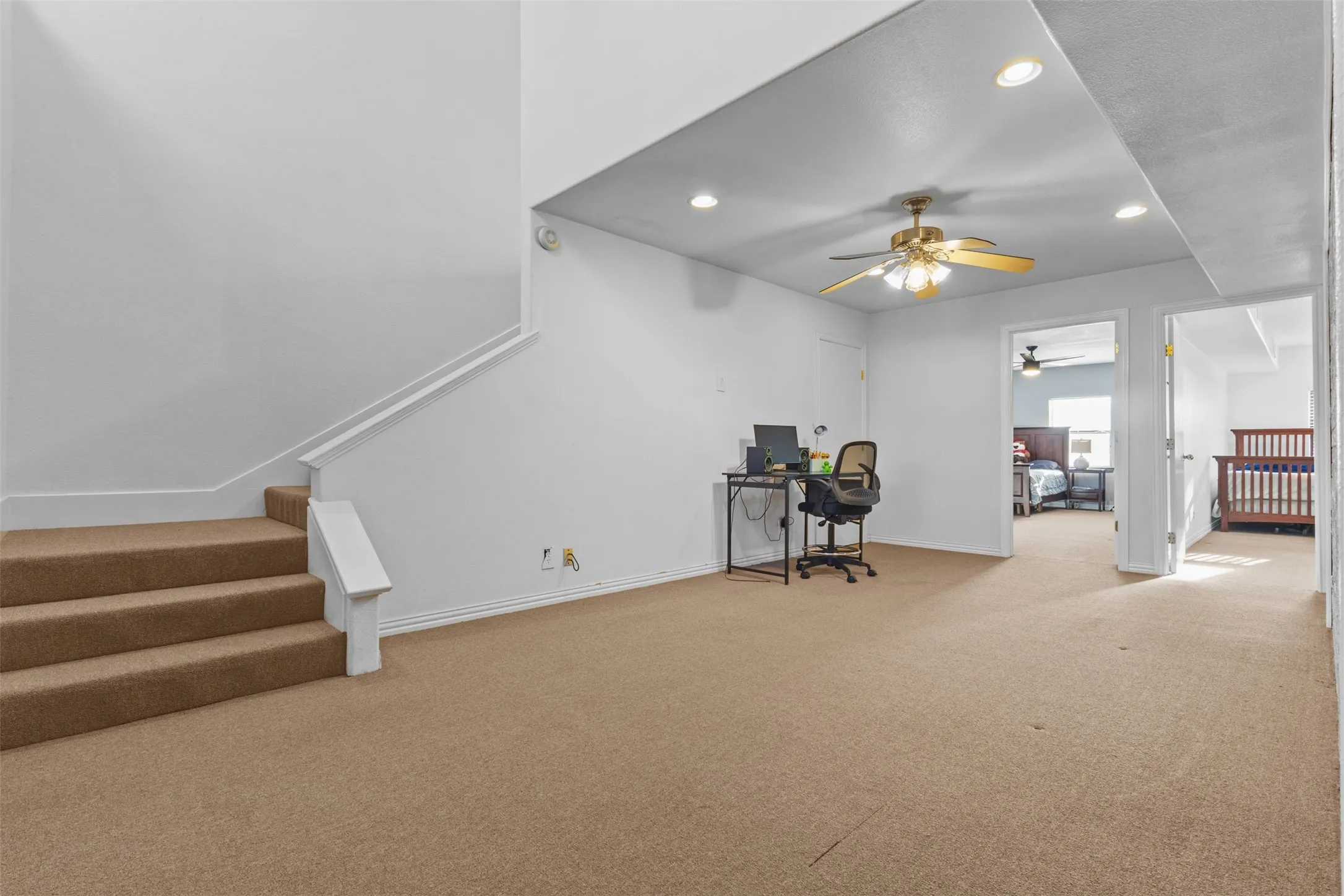 Office area featuring recessed lighting, carpet floors, and ceiling fan