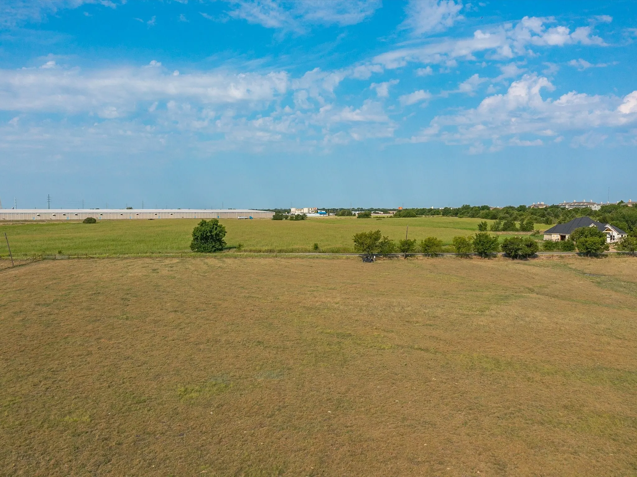 View of green lawn featuring a view of countryside