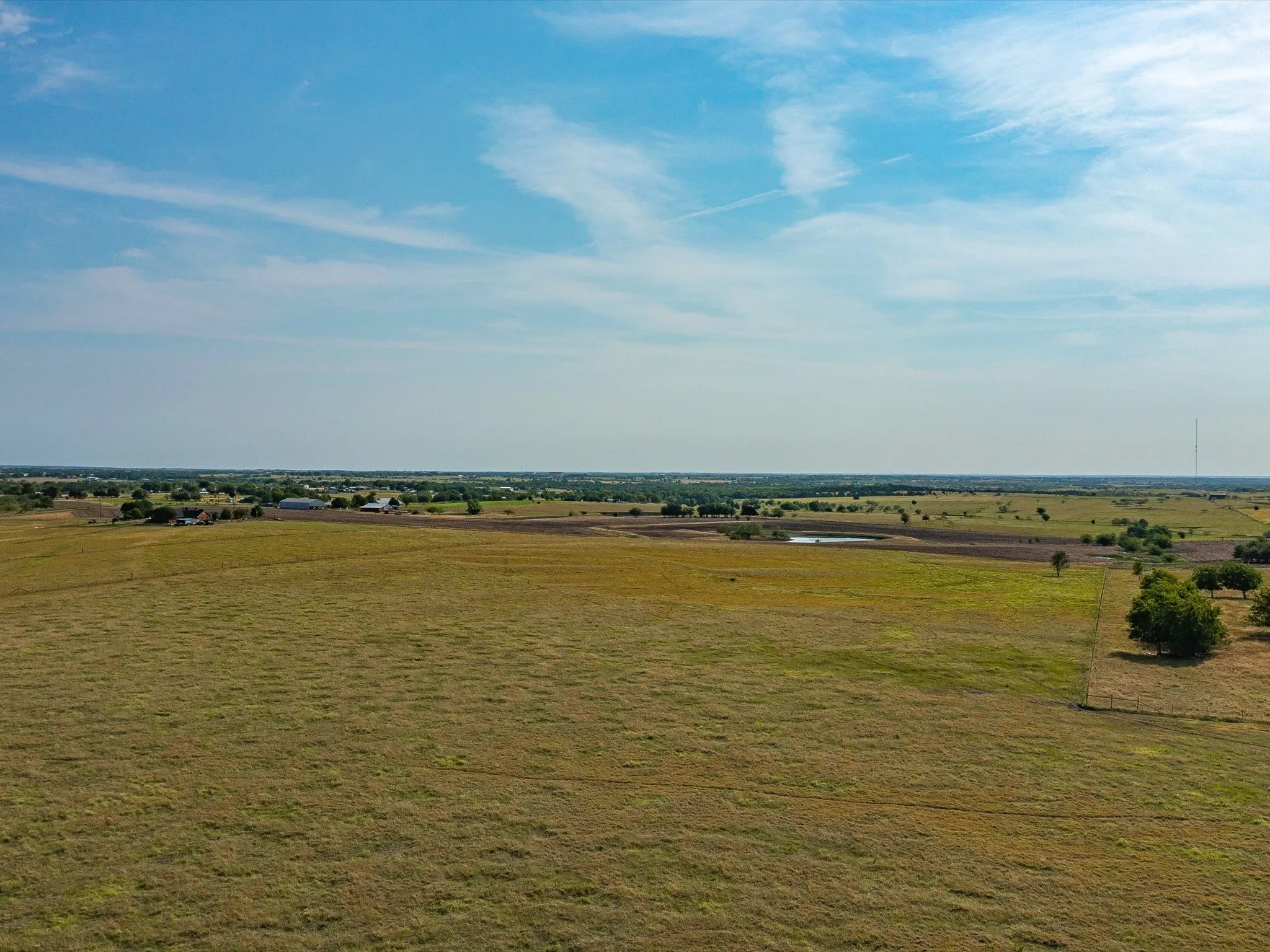 View of green lawn with a view of countryside