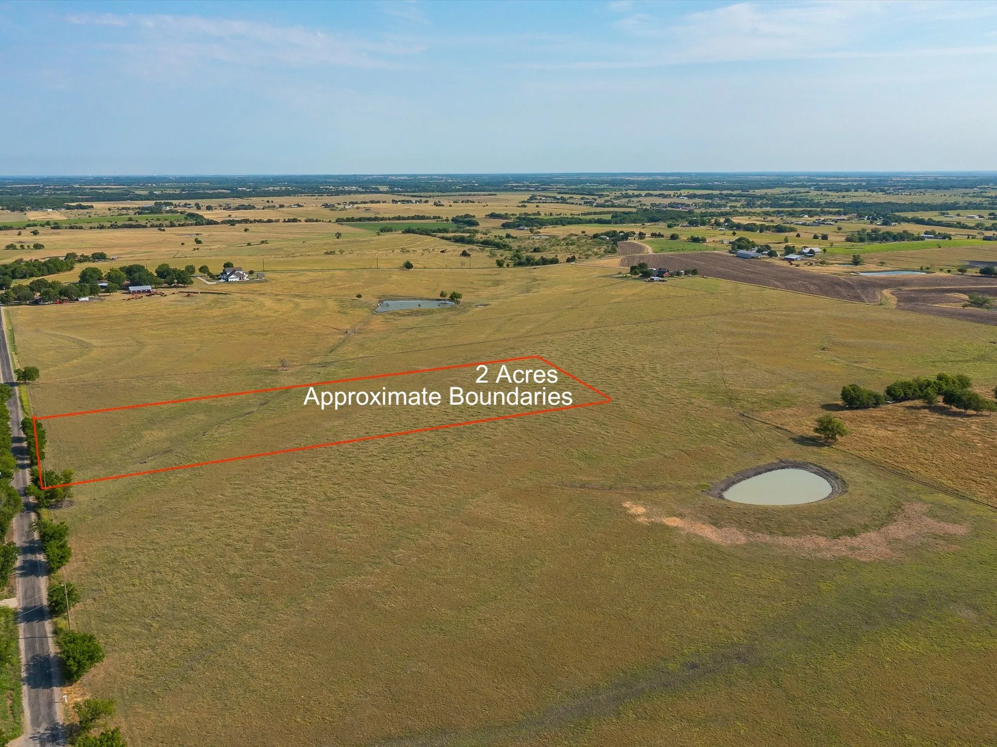 Overview of rural landscape with property parcel outlined