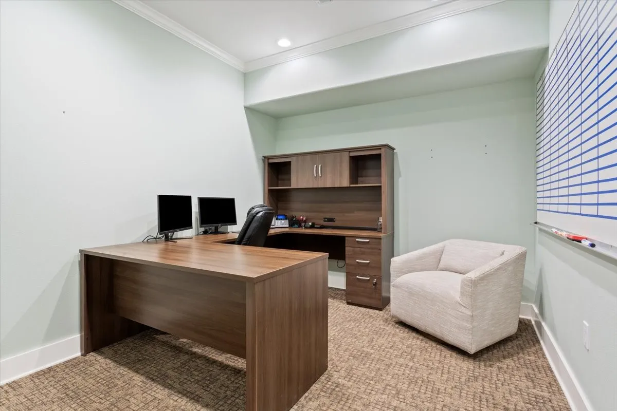 Office area featuring ornamental molding, light carpet, and recessed lighting