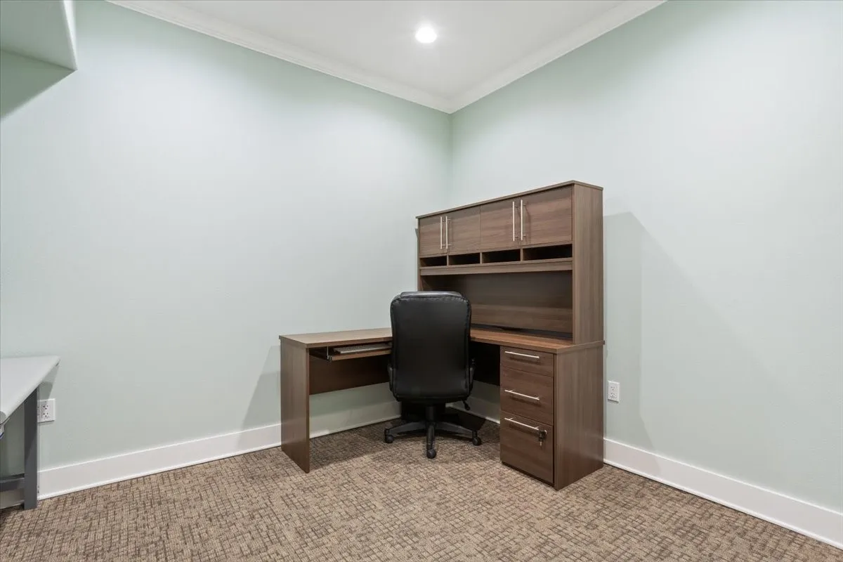 Office area featuring ornamental molding, light colored carpet, and recessed lighting