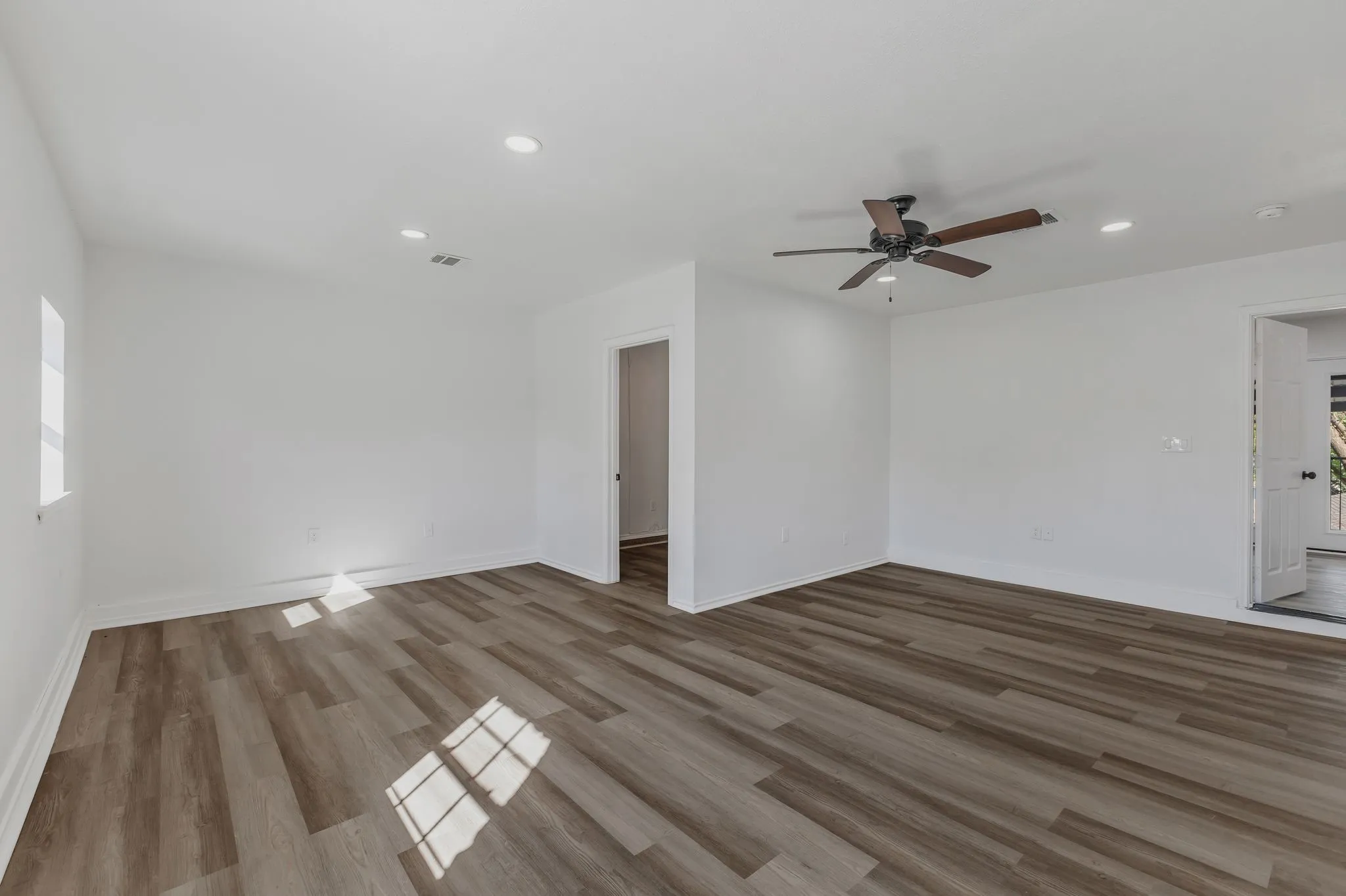 Unfurnished room featuring recessed lighting, wood finished floors, and ceiling fan