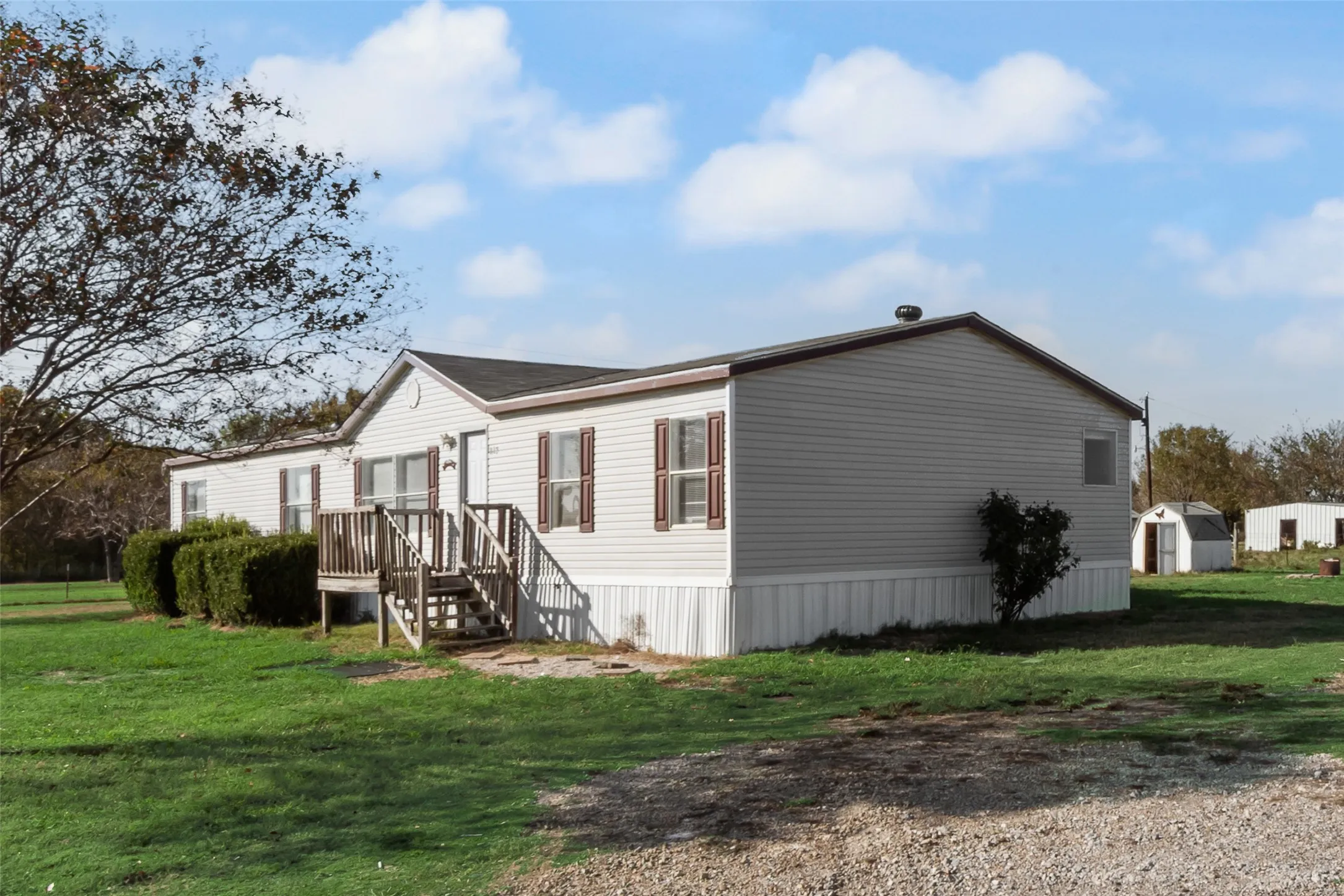 View of home's exterior featuring a yard