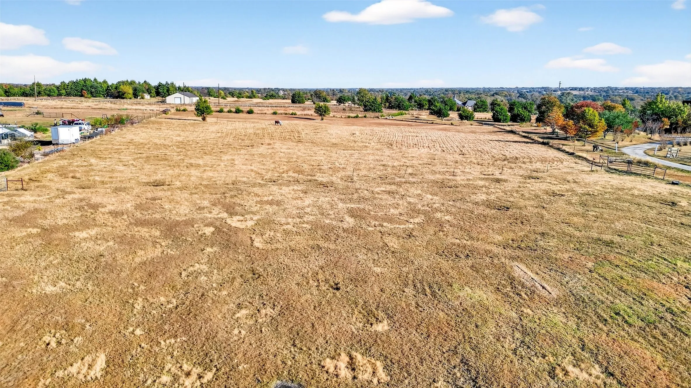 Overview of rural landscape featuring extensive farmland
