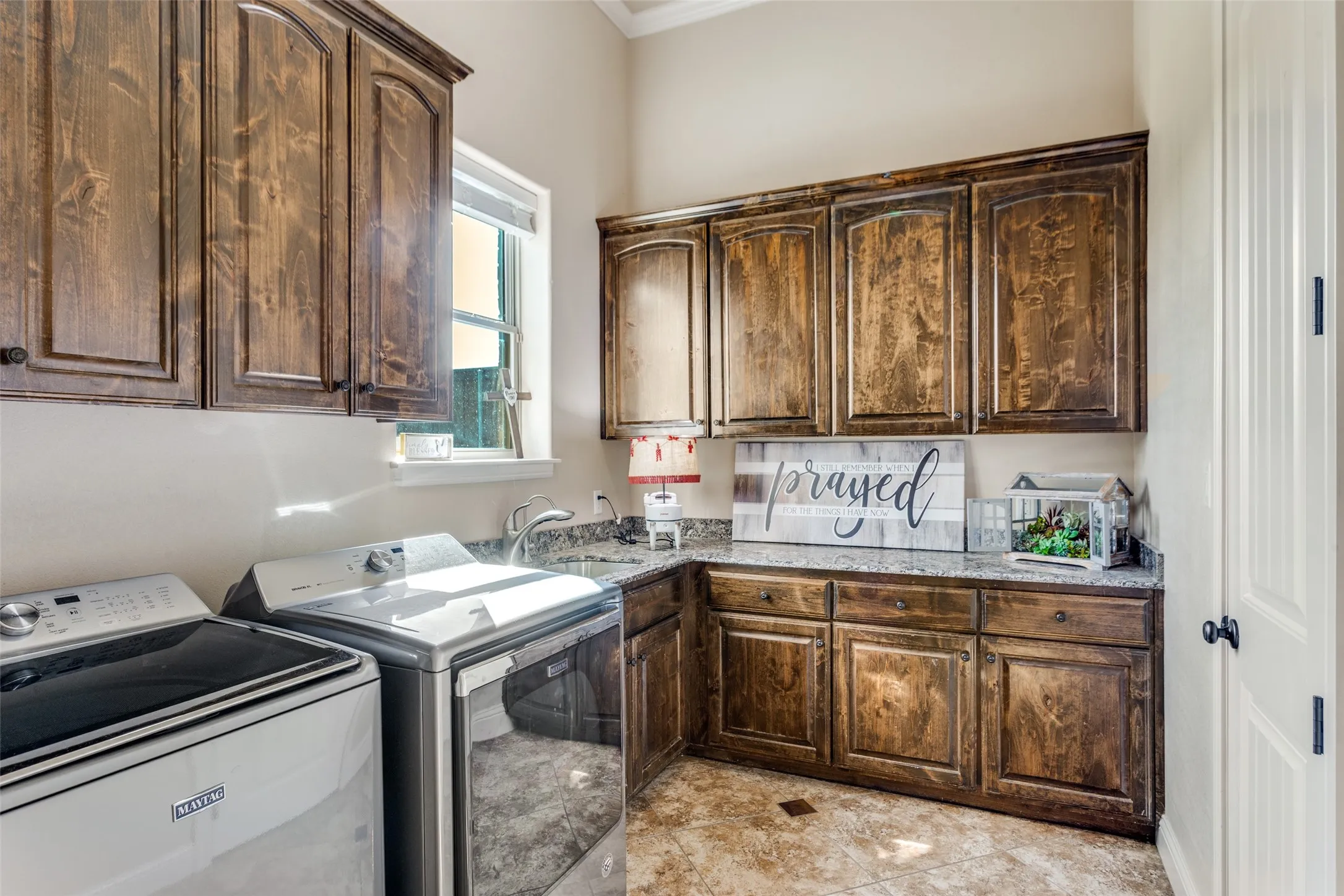 Oversized laundry with closet and lots of storage.