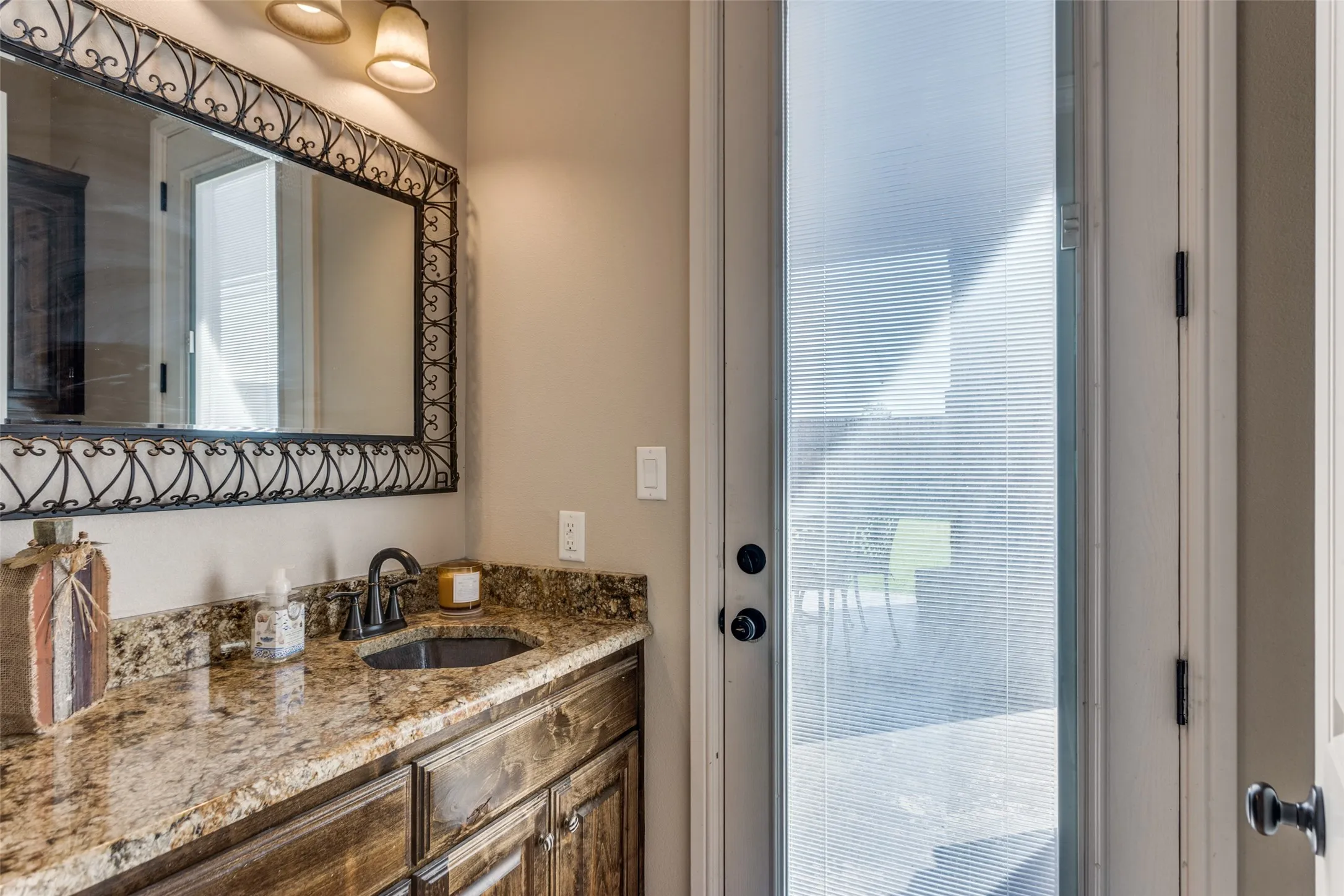 Half bath with patio access.