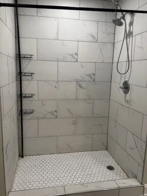 Bathroom featuring a stall shower