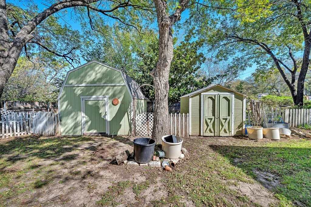 View of shed featuring a fenced backyard