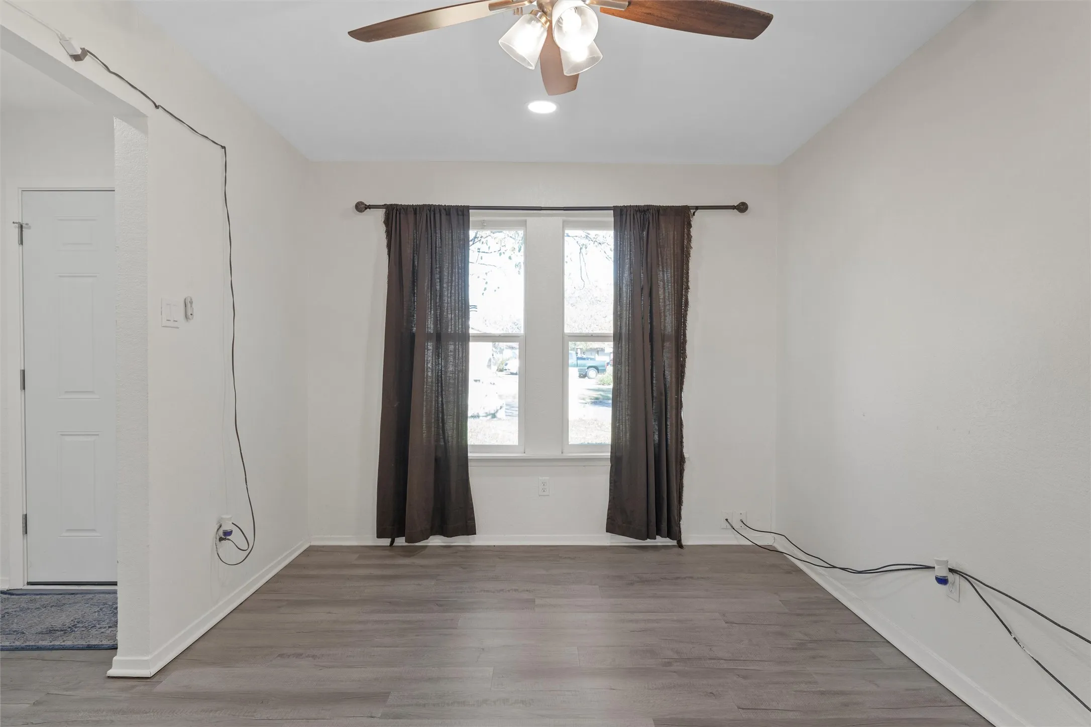 Dining space, a ceiling fan, and recessed lighting
