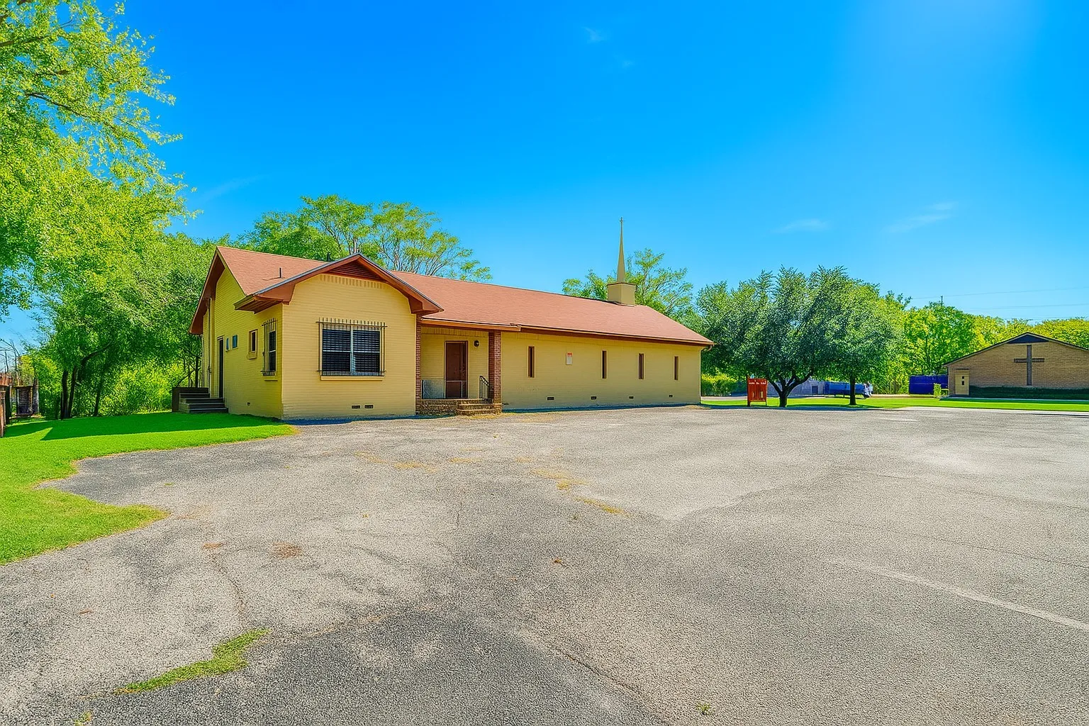 Huge corner lot with ample parking and signage!