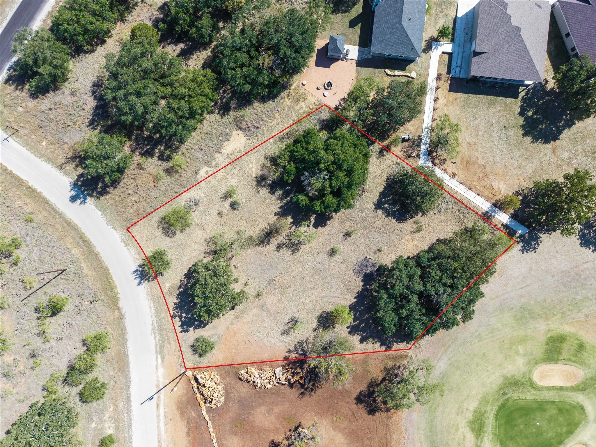 Aerial overview of property on the 4th green of Hideout Golf Course and close proximity to Lake Brownwood