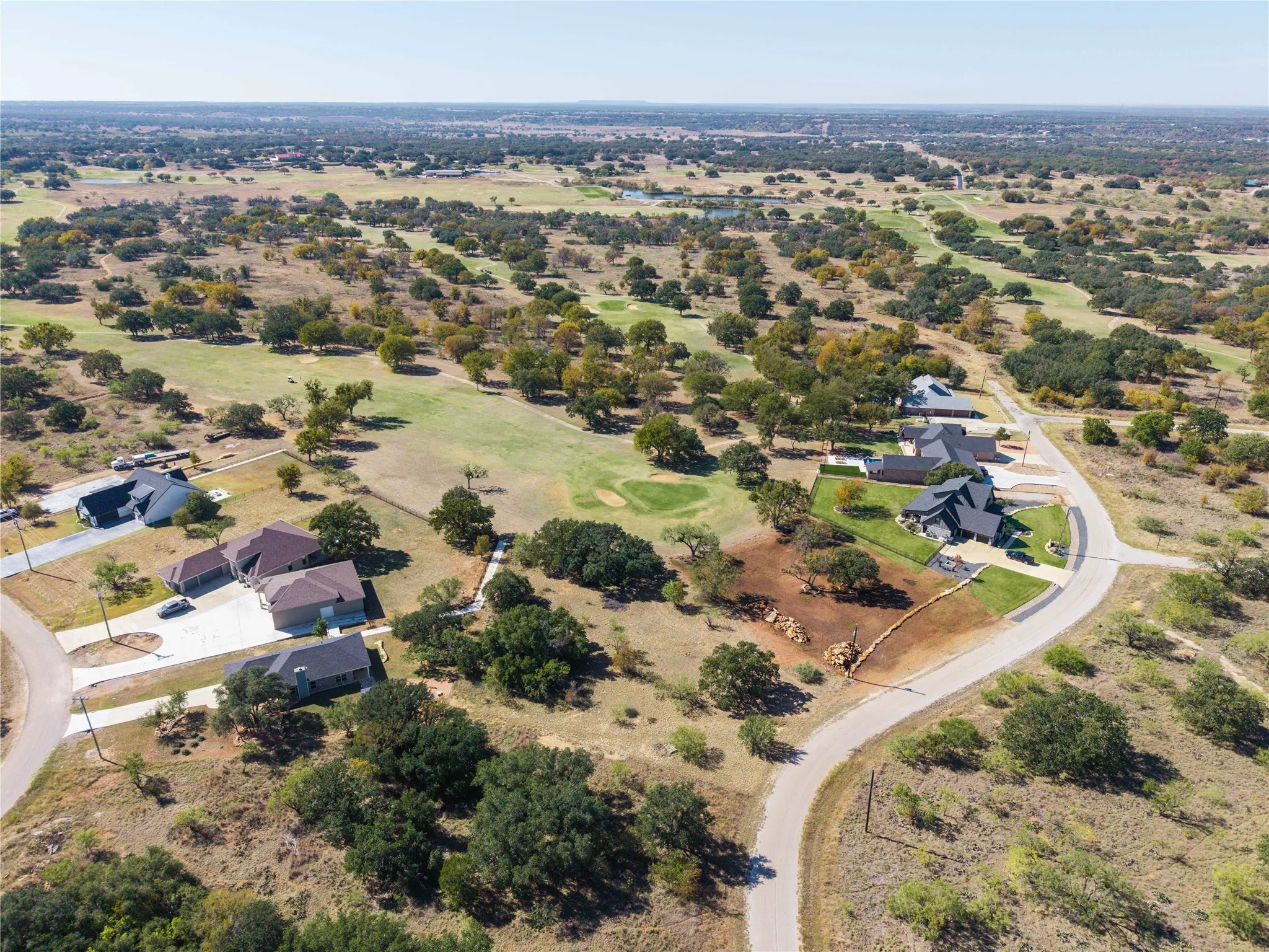 Aerial overview of property on the 4th green of Hideout Golf Course and close proximity to Lake Brownwood