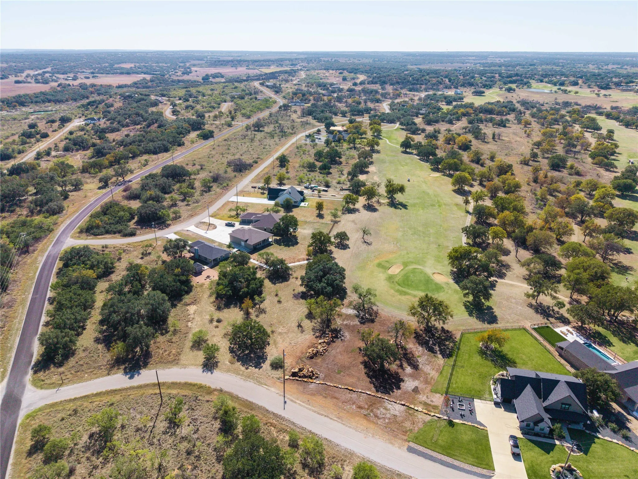 Aerial overview of property on the 4th green of Hideout Golf Course and close proximity to Lake Brownwood