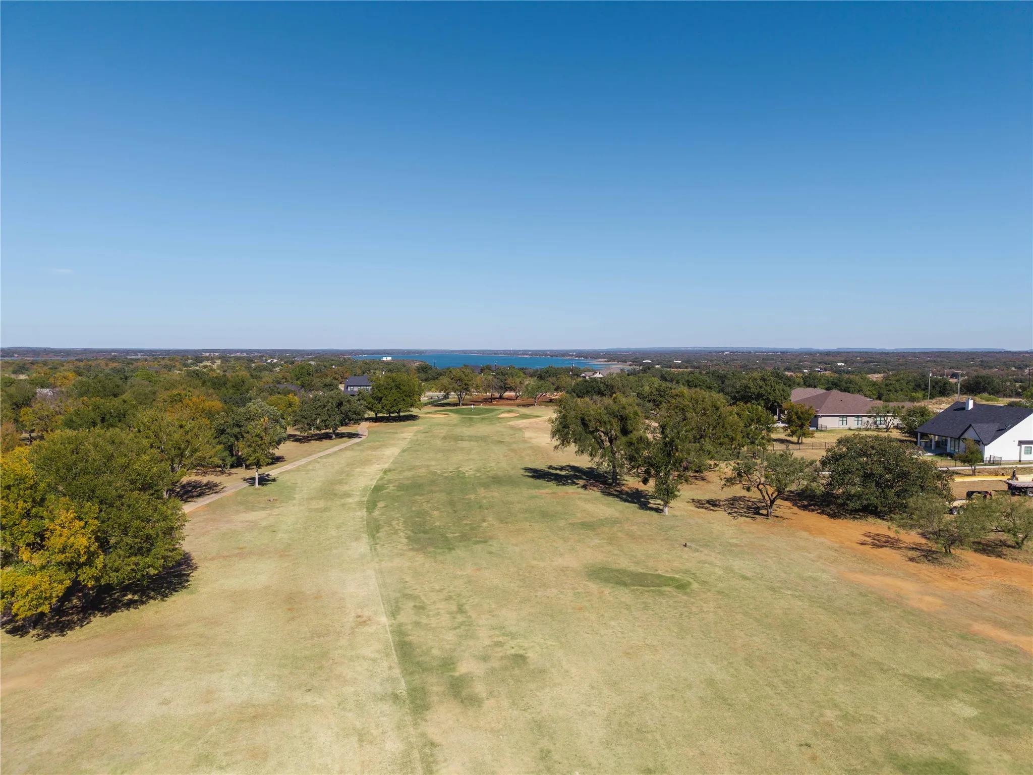Aerial overview of property on the 4th green of Hideout Golf Course and close proximity to Lake Brownwood